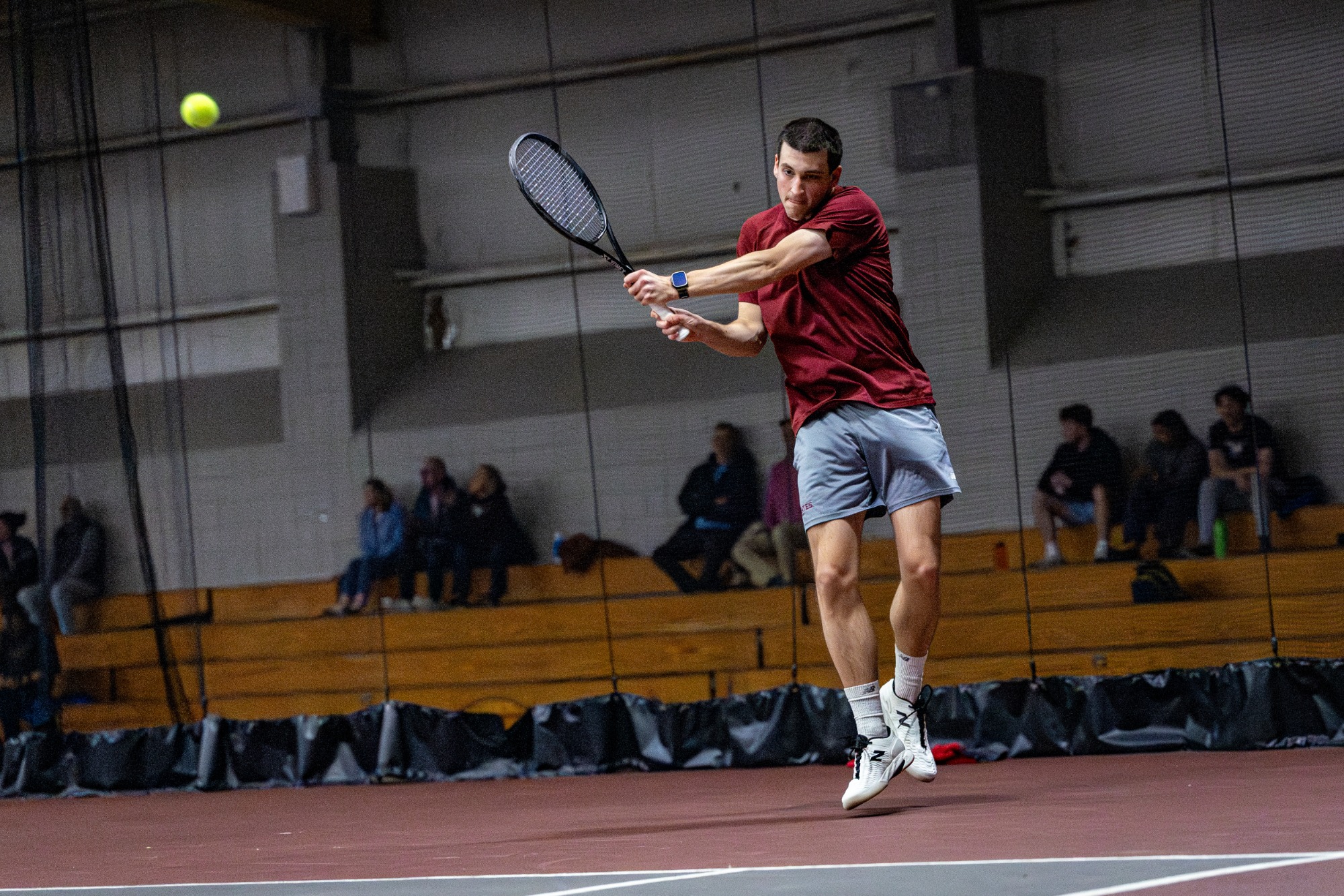 Bates Mens Tennis plays Bowdoin College inside on a bright and cold late March day at home.