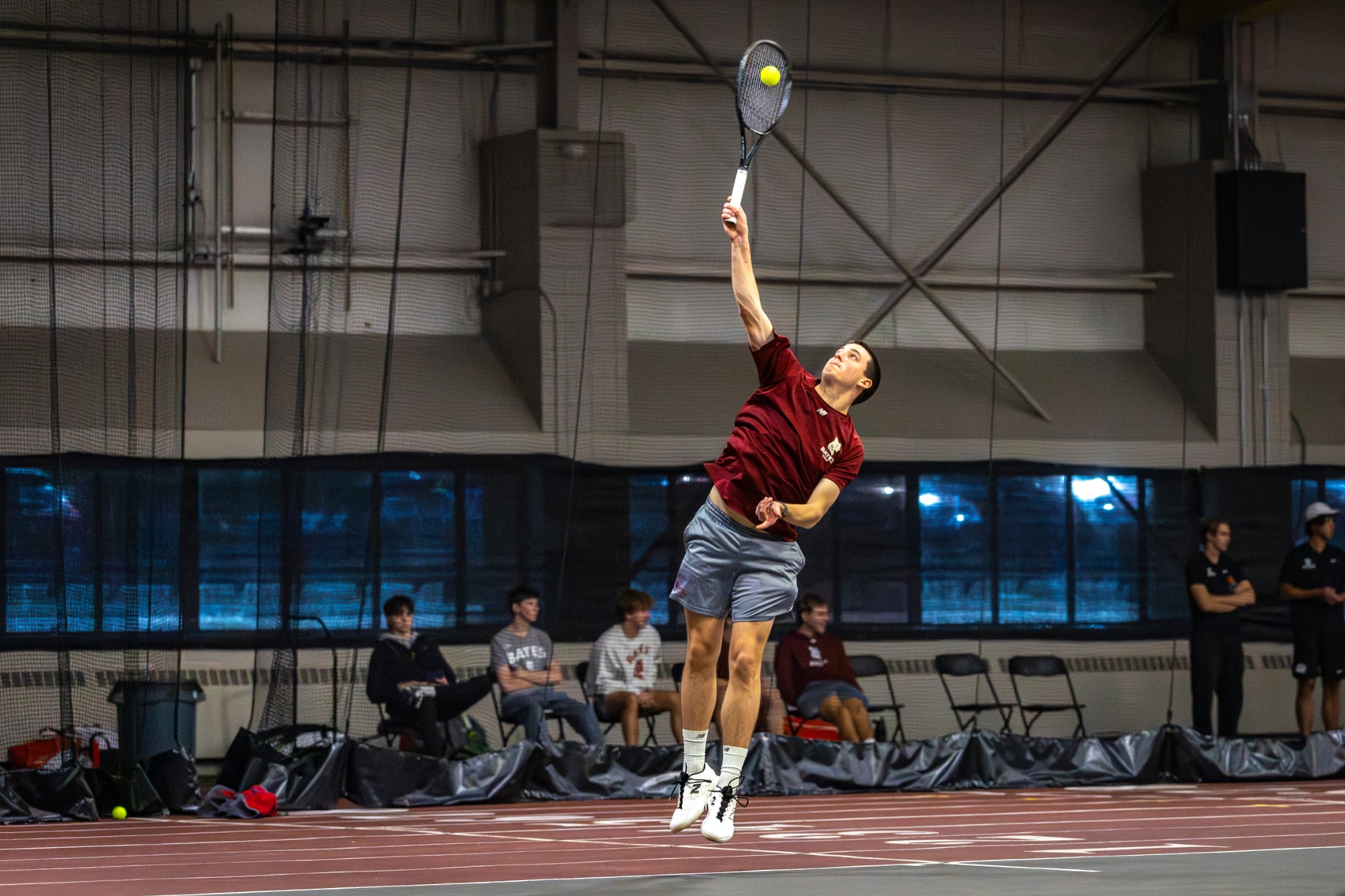 Bates Mens Tennis plays Bowdoin College inside on a bright and cold late March day at home.