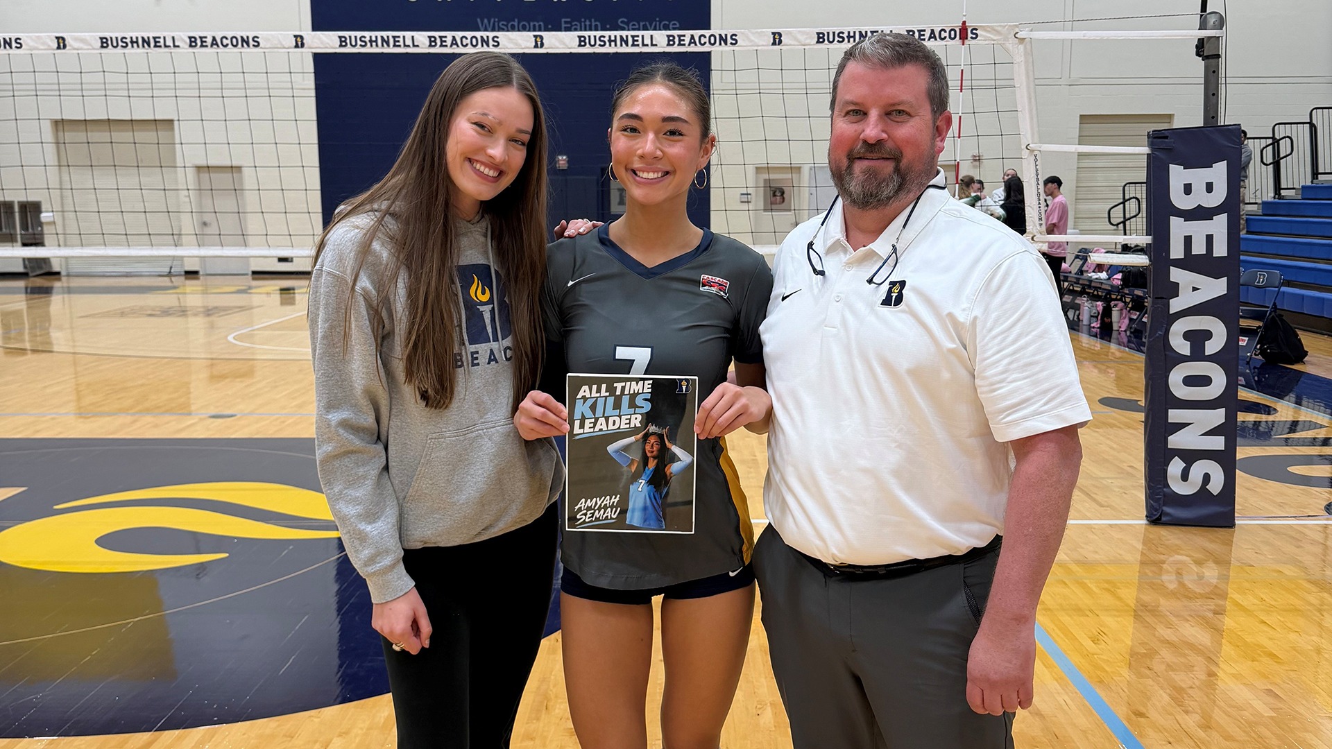 Amyah Semau Breaks Bushnell Career Kills Record - Middle with Halle Neuman (L) and Jason Corwin (R)