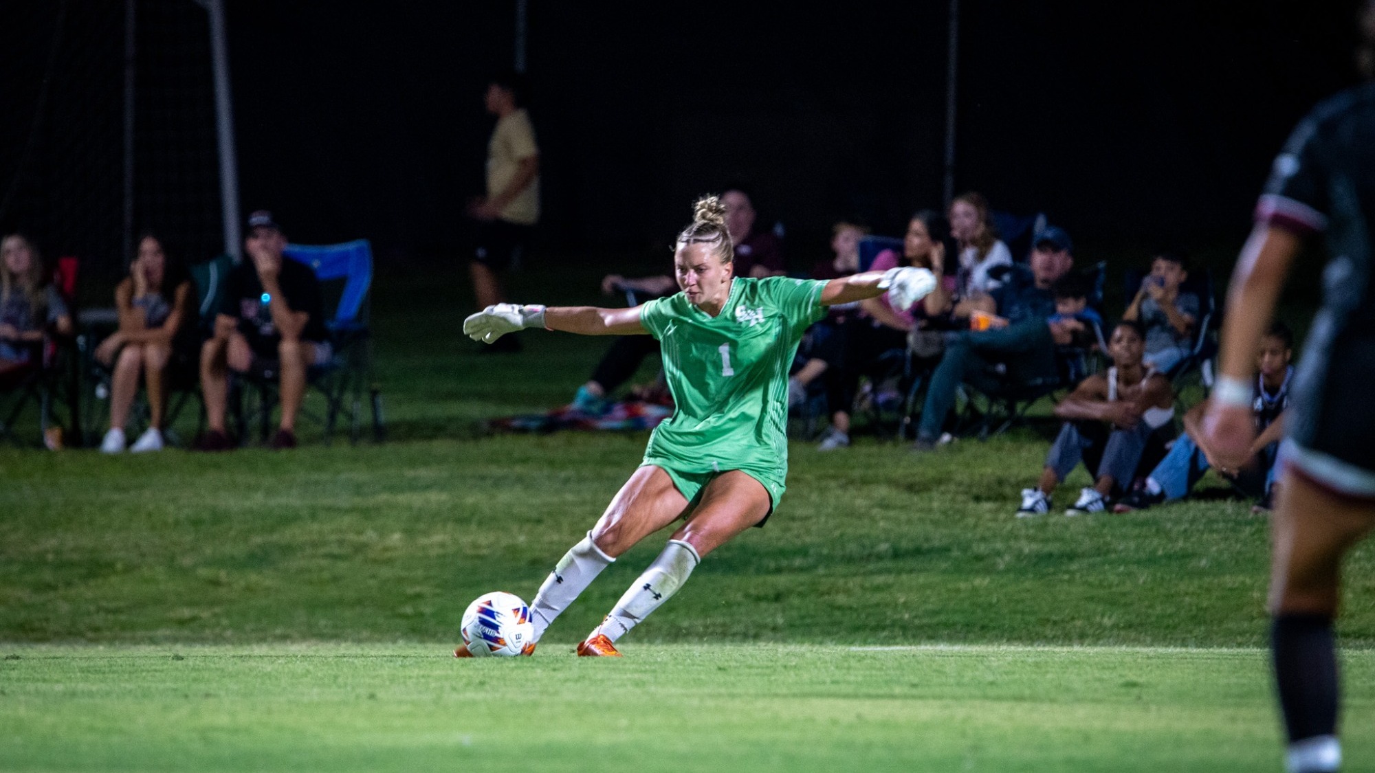 Keeper Katie Bahn launches a free kick