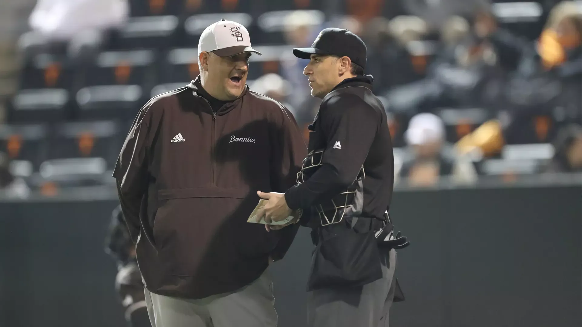 Coach Razz with umpire