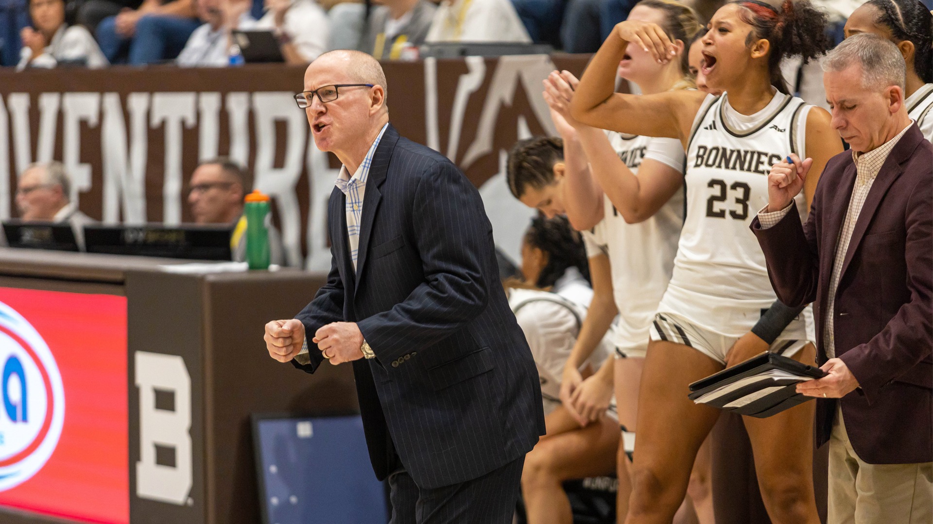 Coach Crowley reacting to a bucket