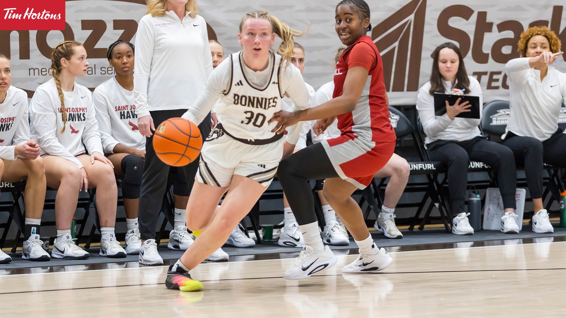 Elyse MacDonough dribbling