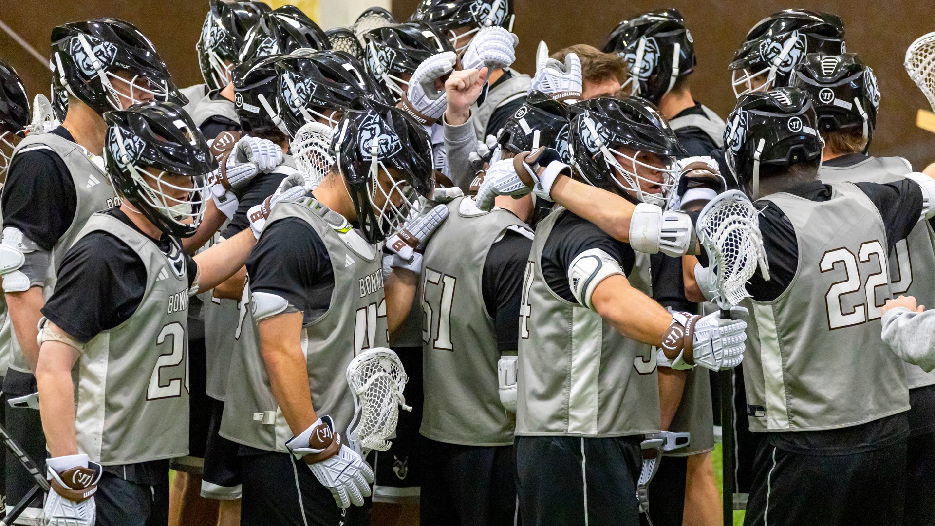 Men's lacrosse indoor practice huddle