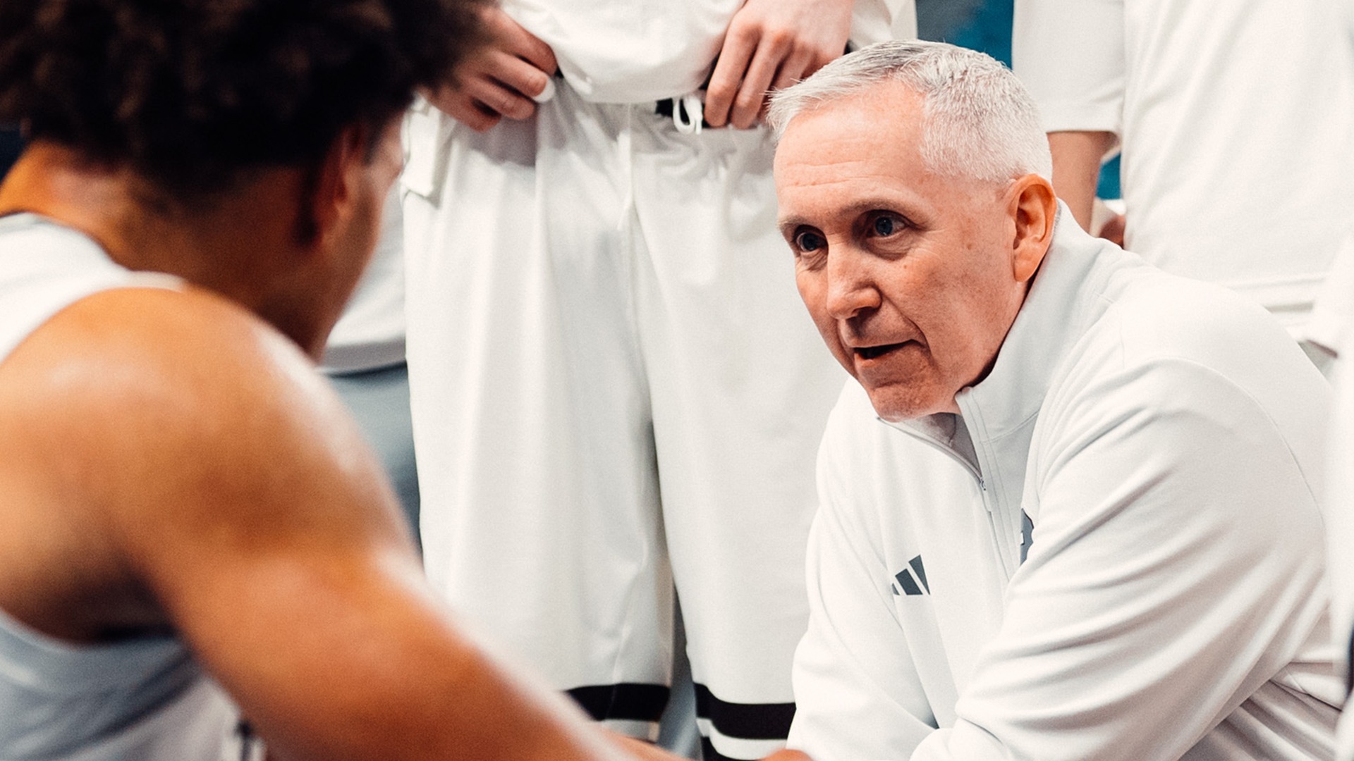 Mike MacDonald in the huddle