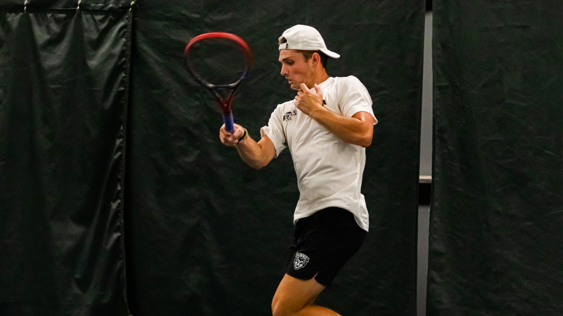 Davis Matney hitting a forehand