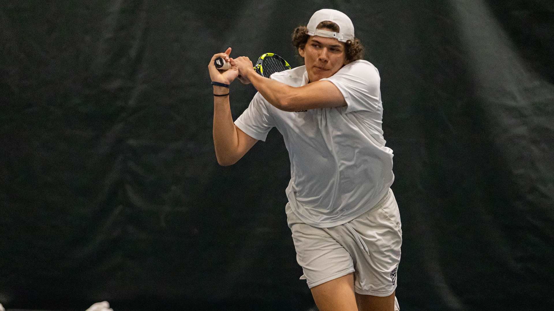 Chase Cahill-Welsh hitting a backhand