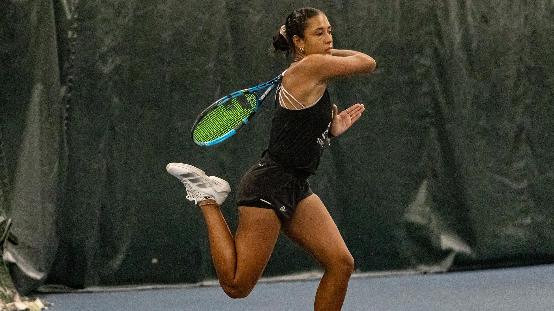 Sienna Smith on the baseline