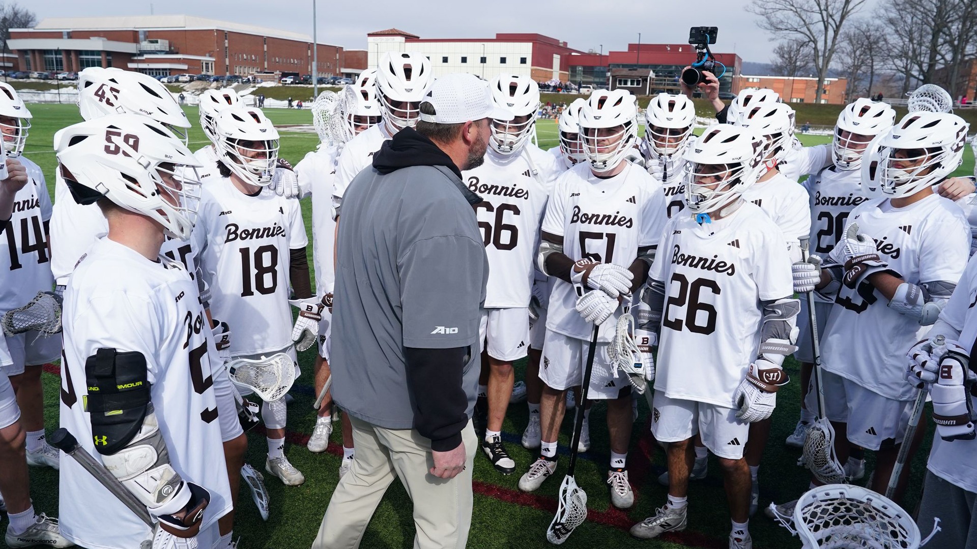 Men's Lacrosse huddle 