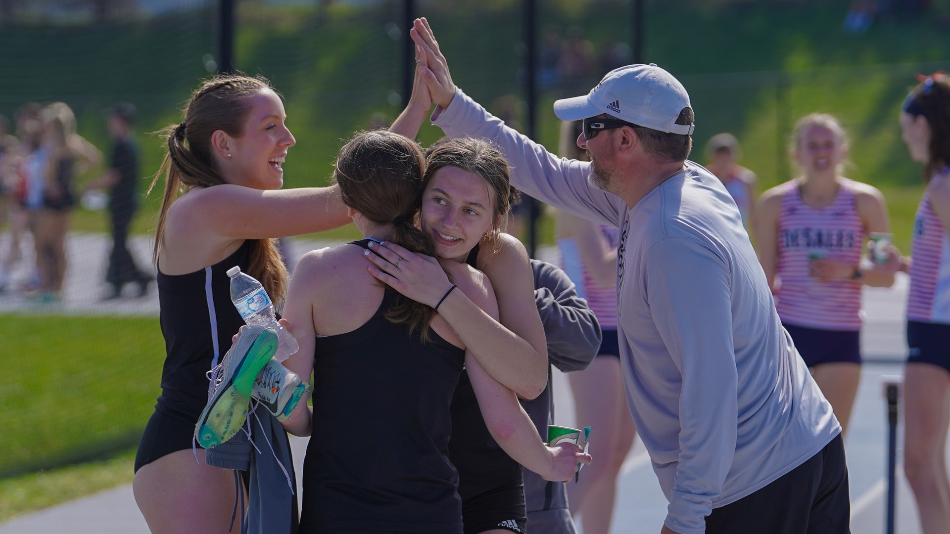 St. Bonaventure's women's sprinters celebrate