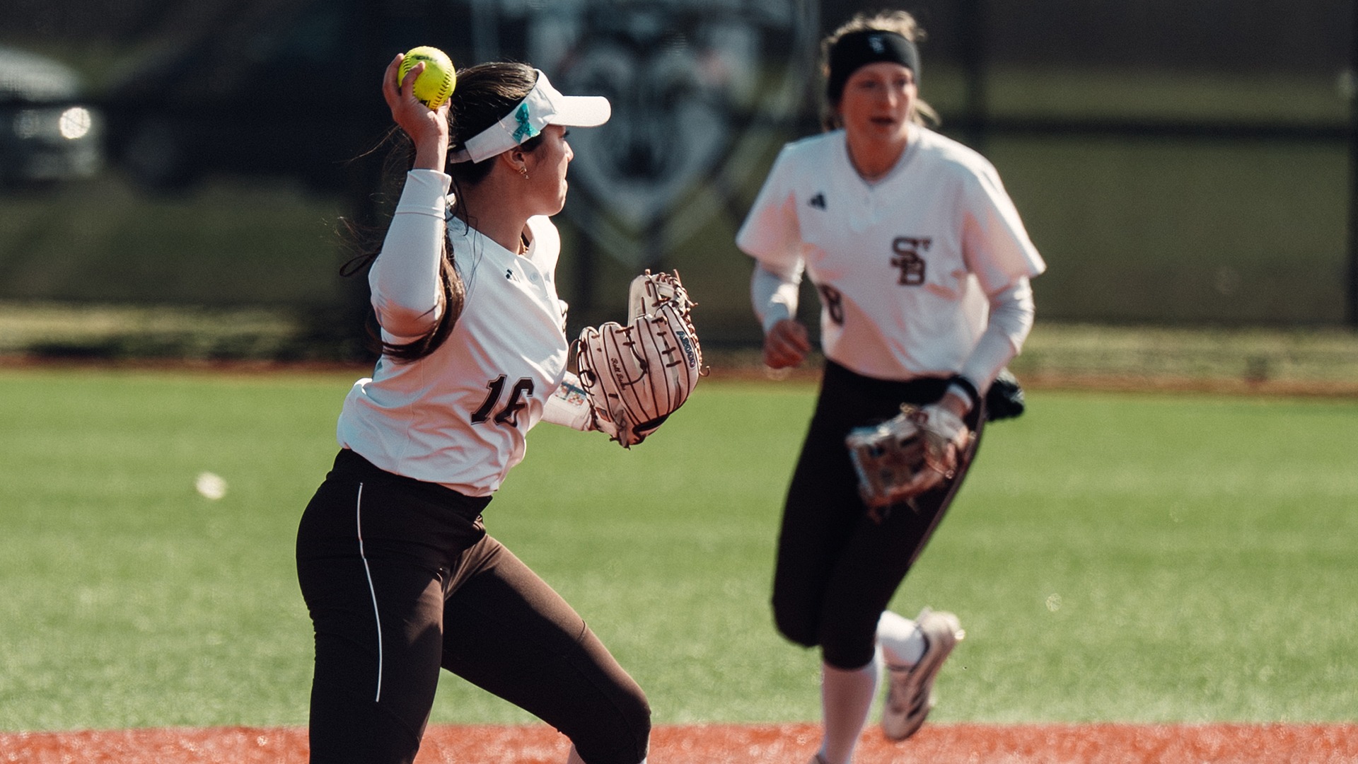 Kymora Wang throwing to first