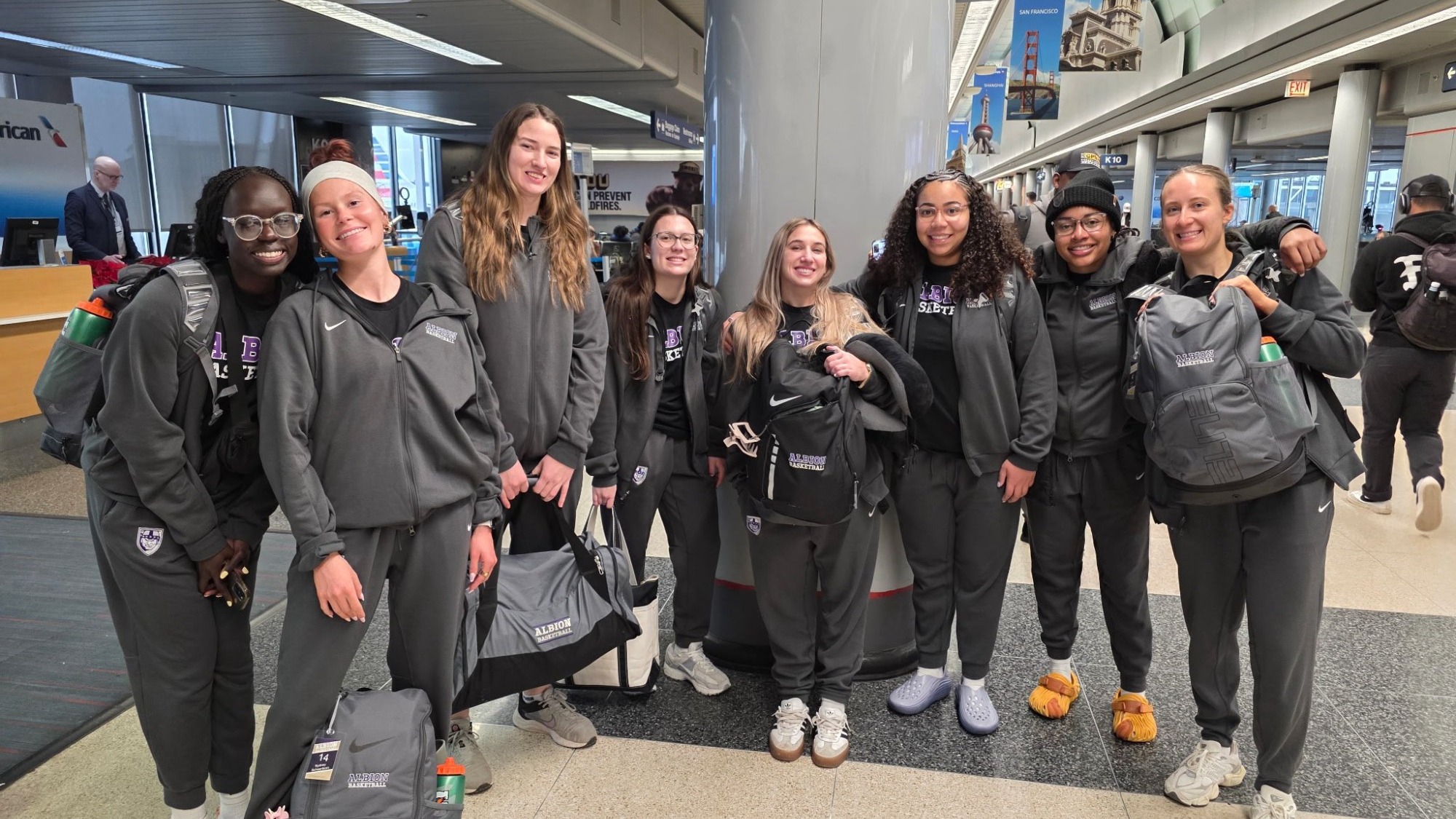 Women's Basketball team at airport