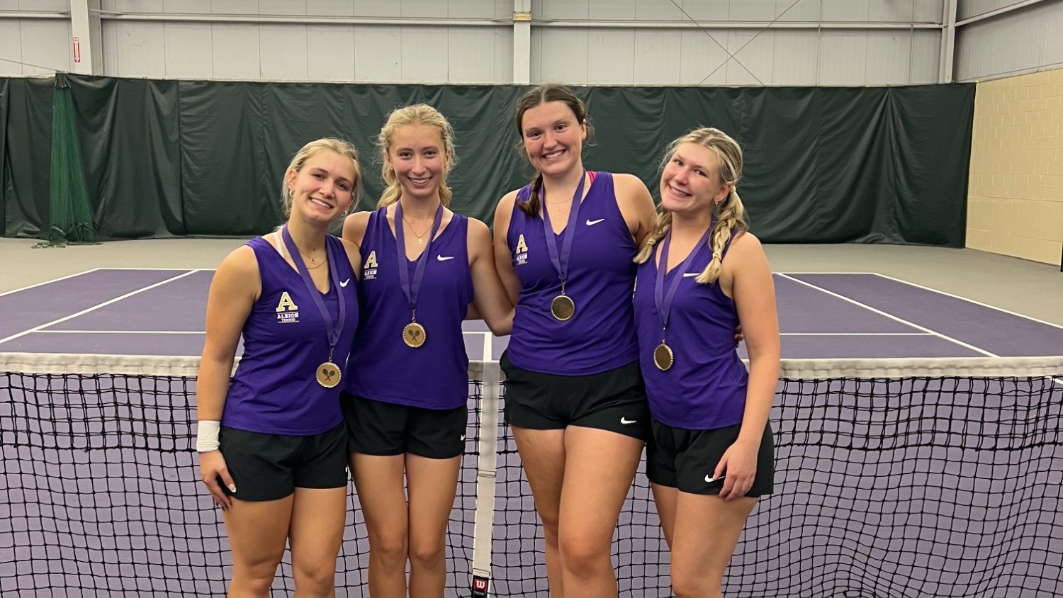 Women's Tennis Poses after Albion Doubles