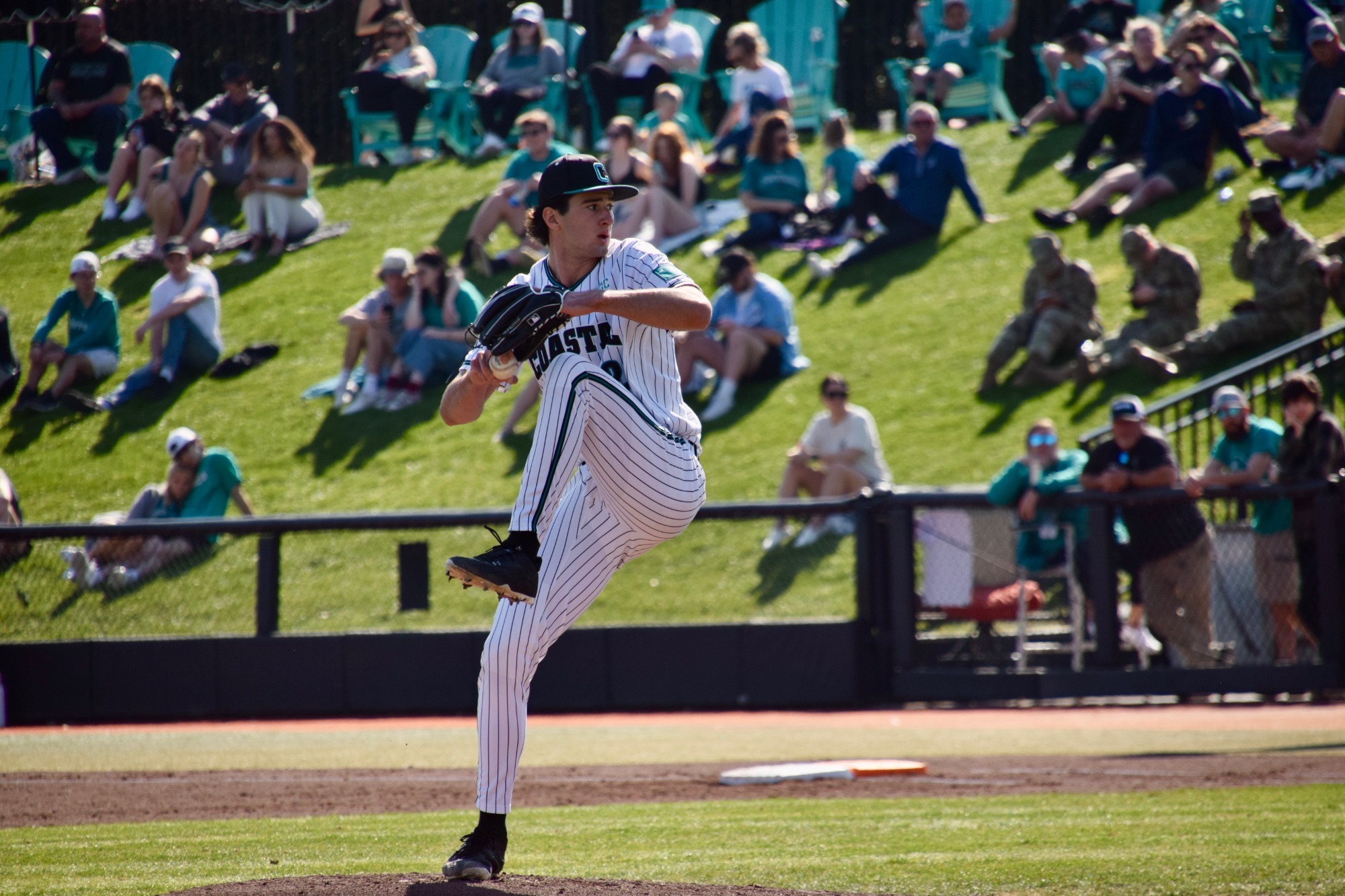 Cameron Flukey pitches against Rutgers on 3/1/2025