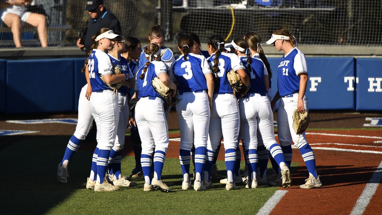Softball Team Huddle vs. Middlebury 2026