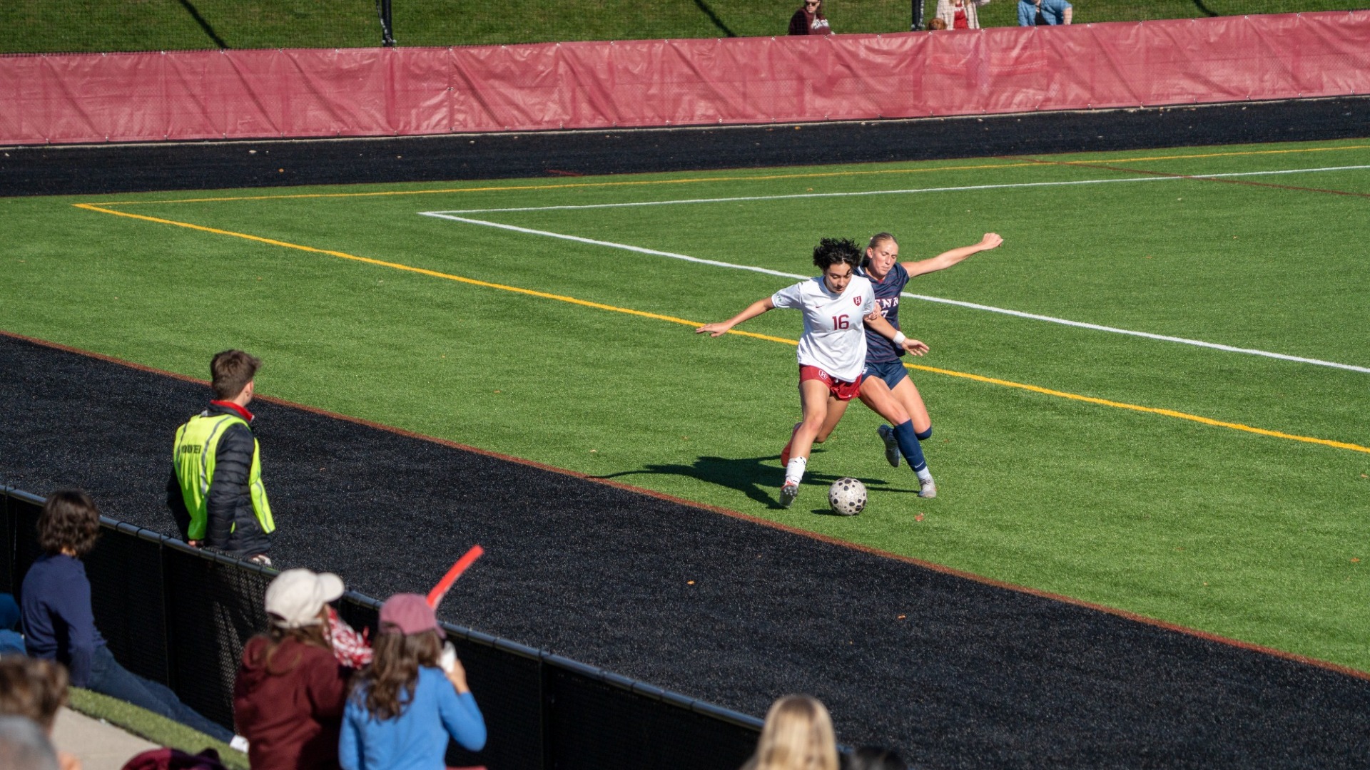 Jasmine Leshnick Dribbles Past a Defender