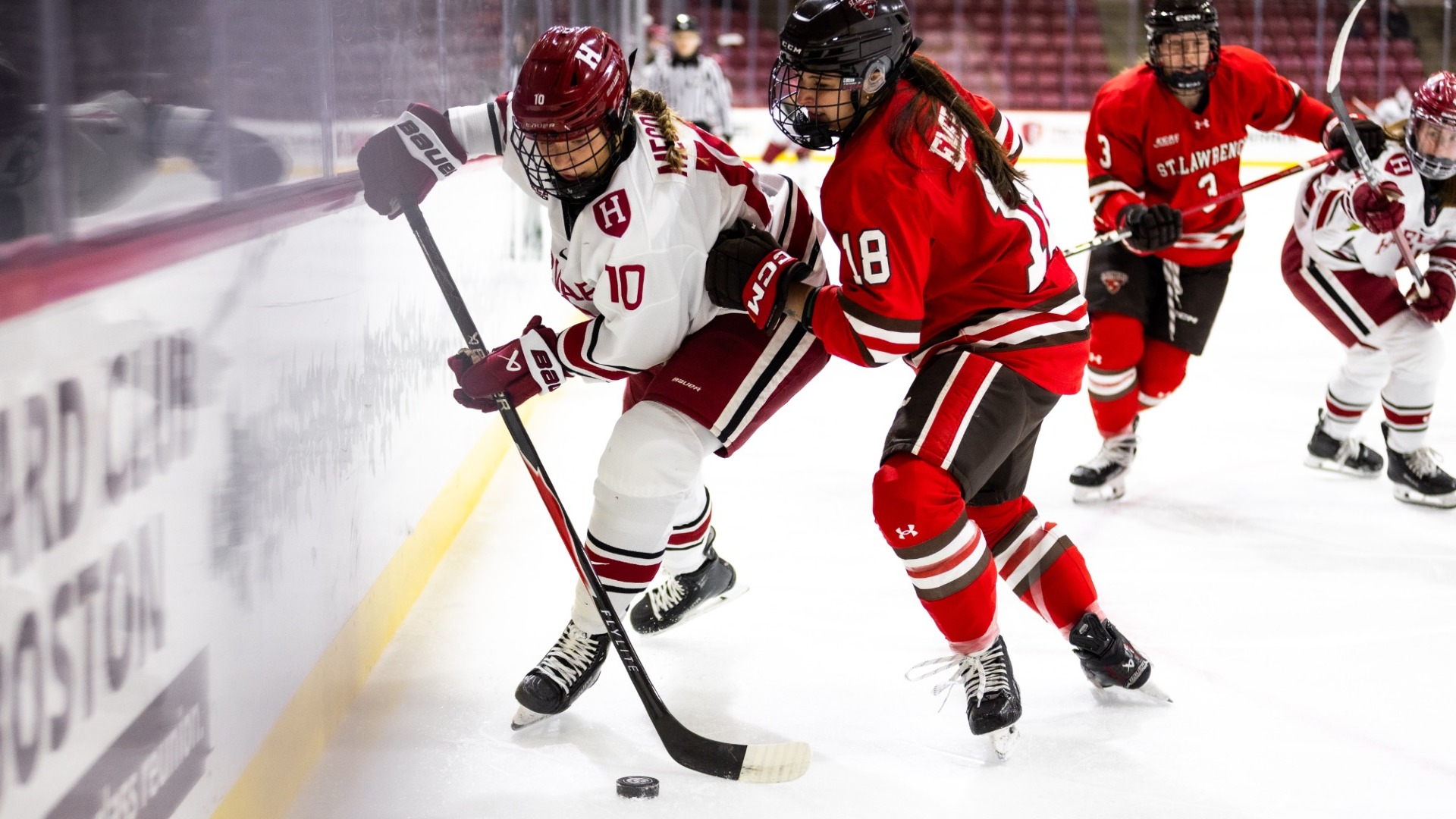 Angelica Megdanis guards the puck against St. Lawrence