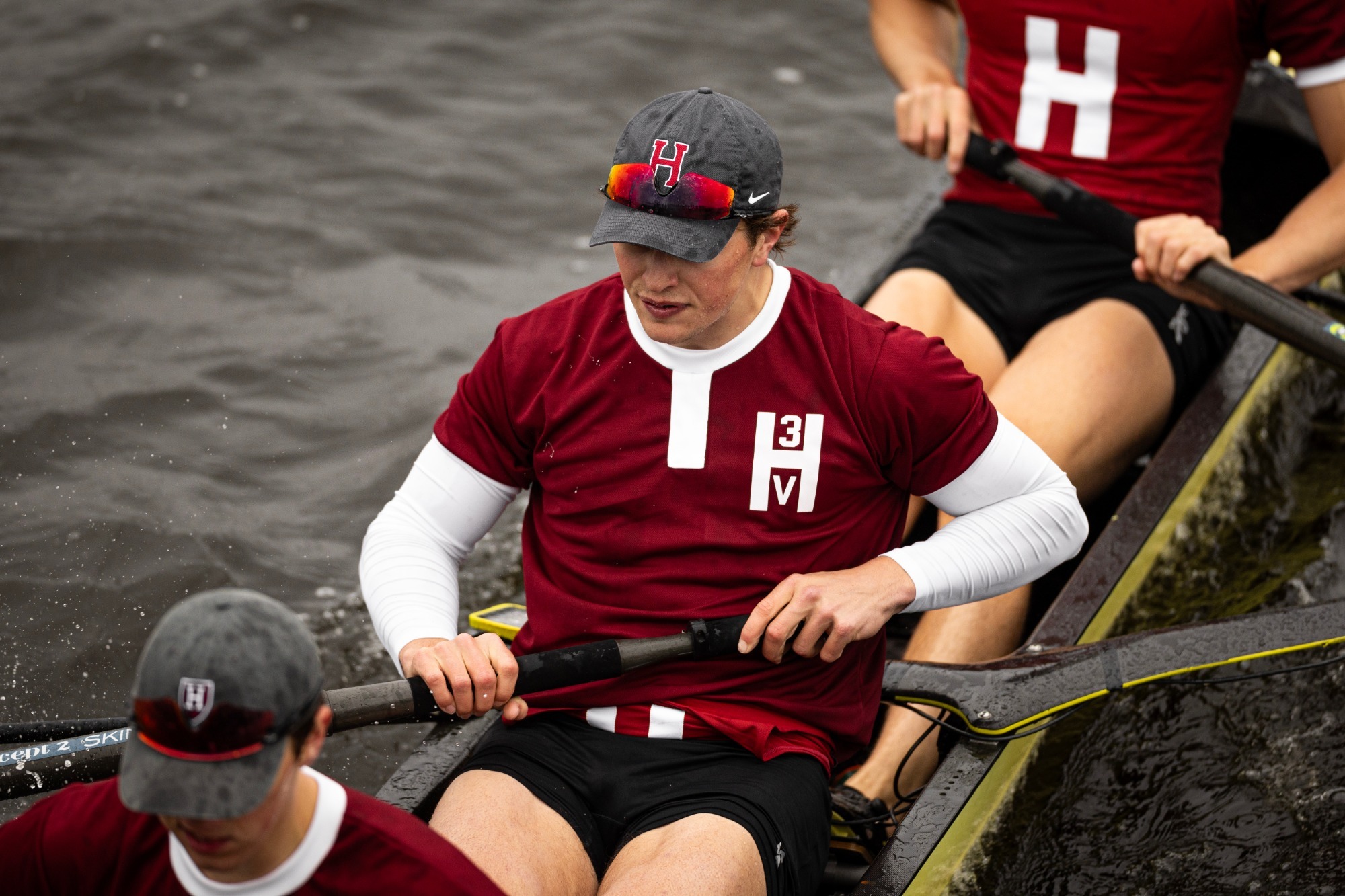 Men's heavyweight third varsity rows against Princeton on the Charles.