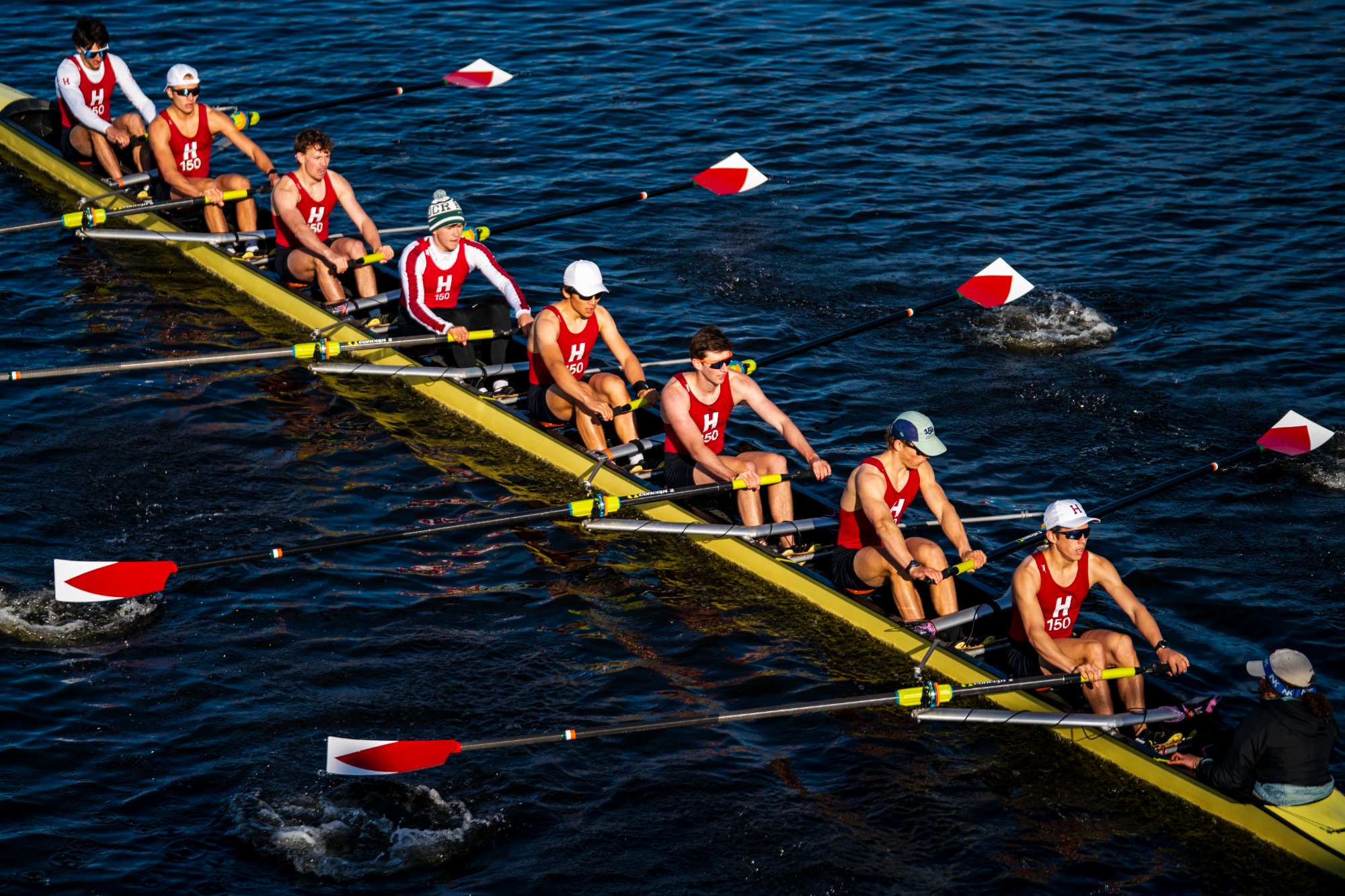 Third varsity eight rows against Princeton and Yale on the Charles River.