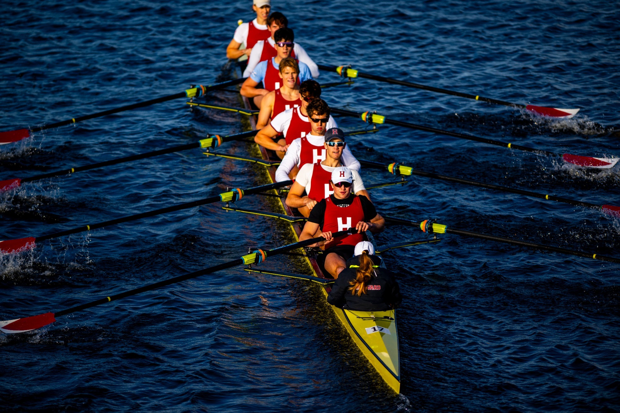 Men's heavyweight rows against Cornell on the Charles River.
