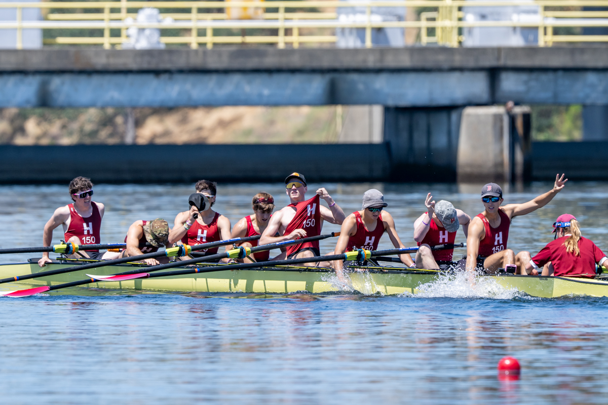 Harvard lightweight varsity celebrate a third-straight win at the IRA National Championship Regatta.