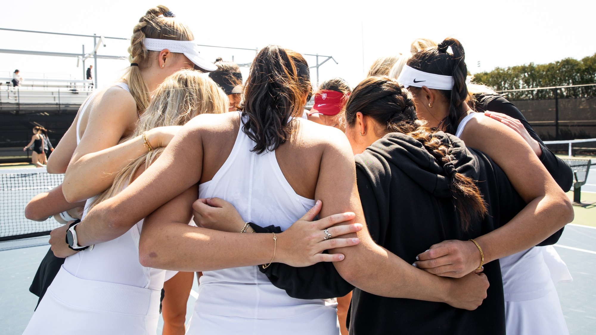 Harvard women's tennis huddle