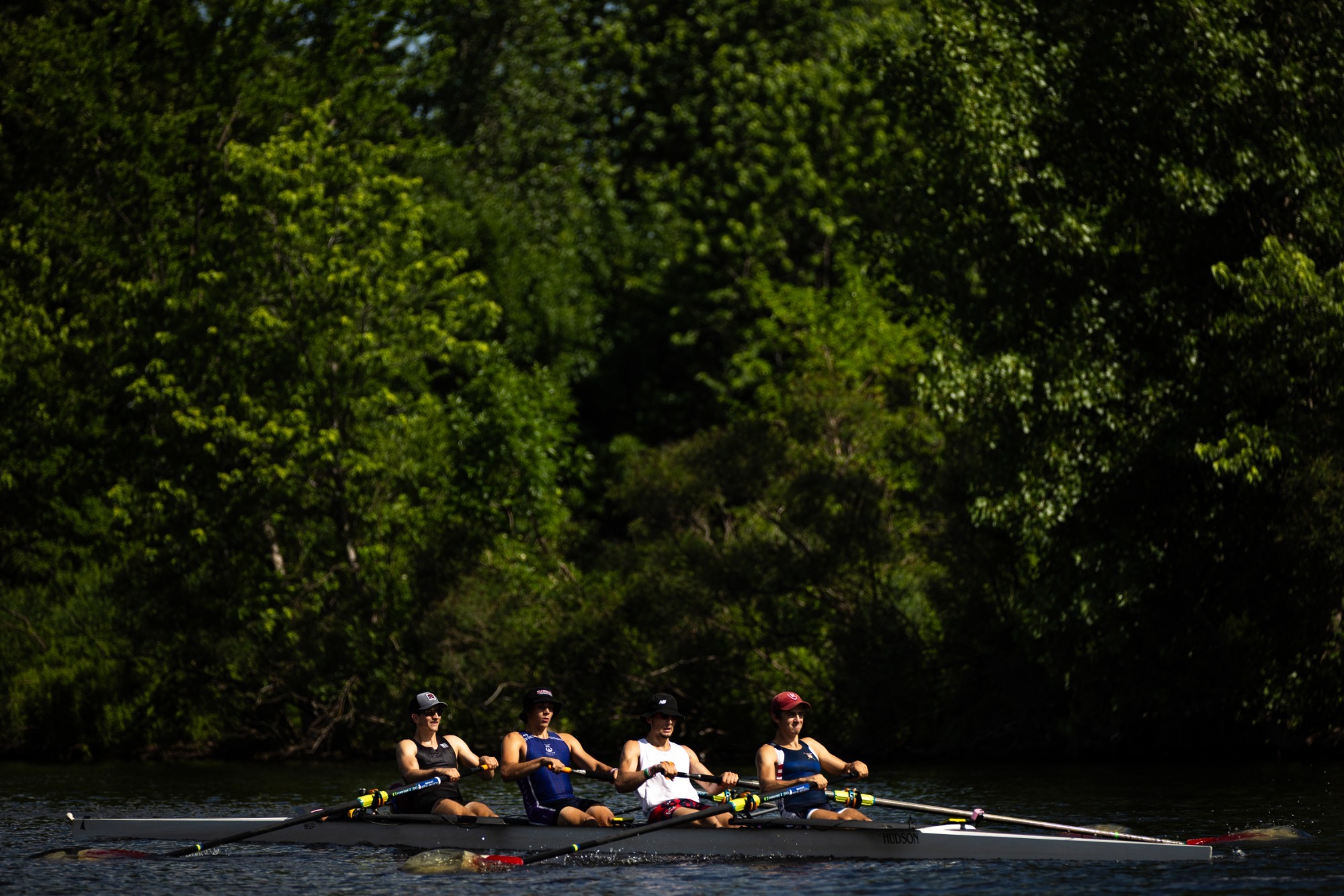 Harvard's four practices on the Charles for the Henley Royal Regatta.