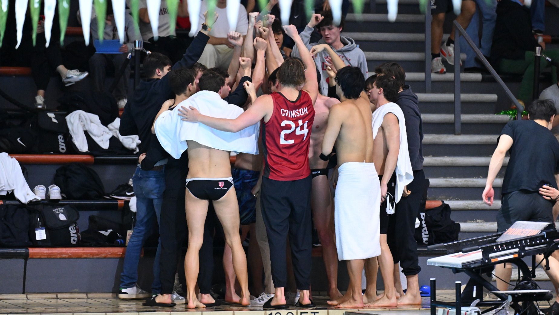 Men's Swimming and Diving huddle at Ivy League Championships