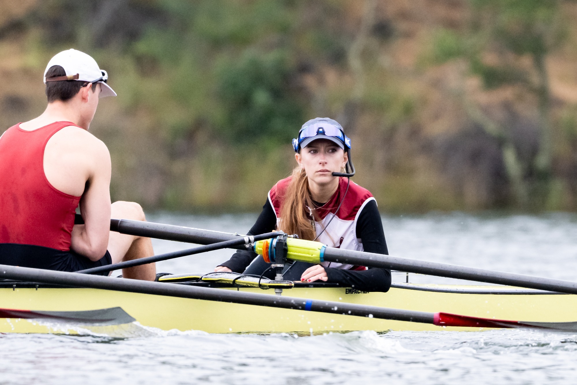 Coxswain Natalia Toms in the stern of the varsity eight boat on day one of the 2026 IRA National Championships.