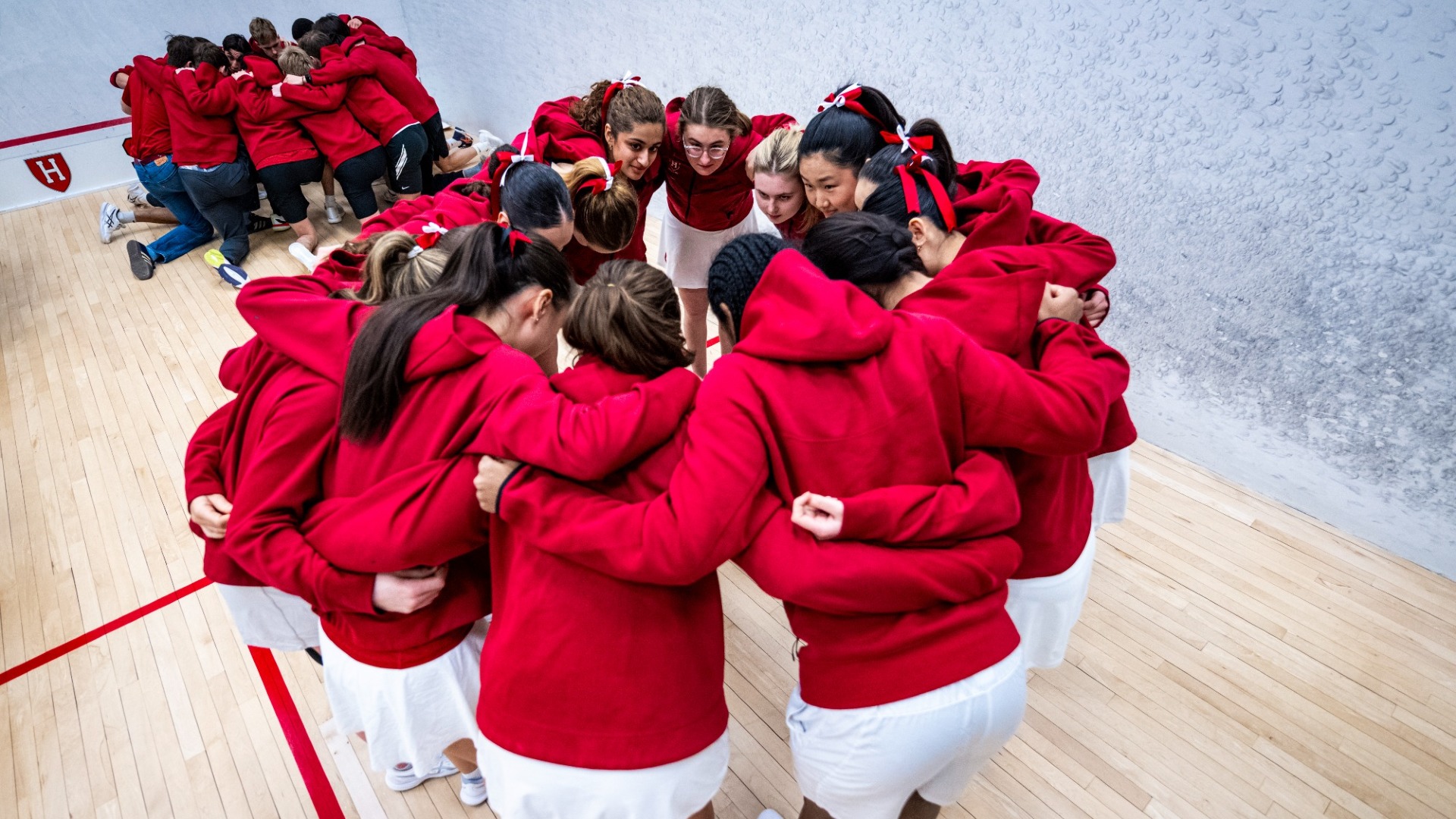 Women's Squash Team Huddle