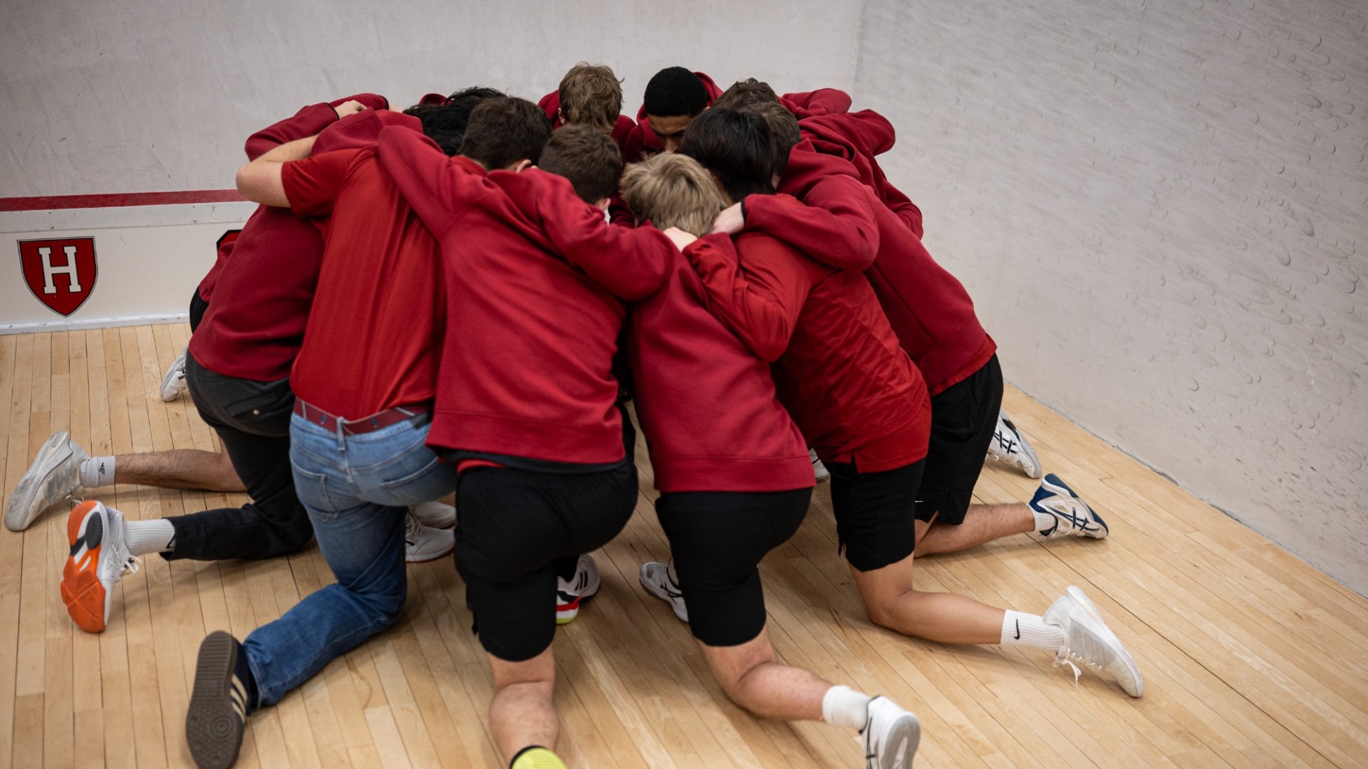 Harvard Men's Squash Team Huddle