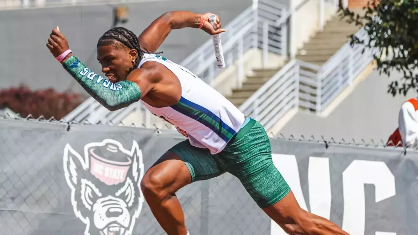 Track & Field Student Athlete Xavier Beatty running at a event 