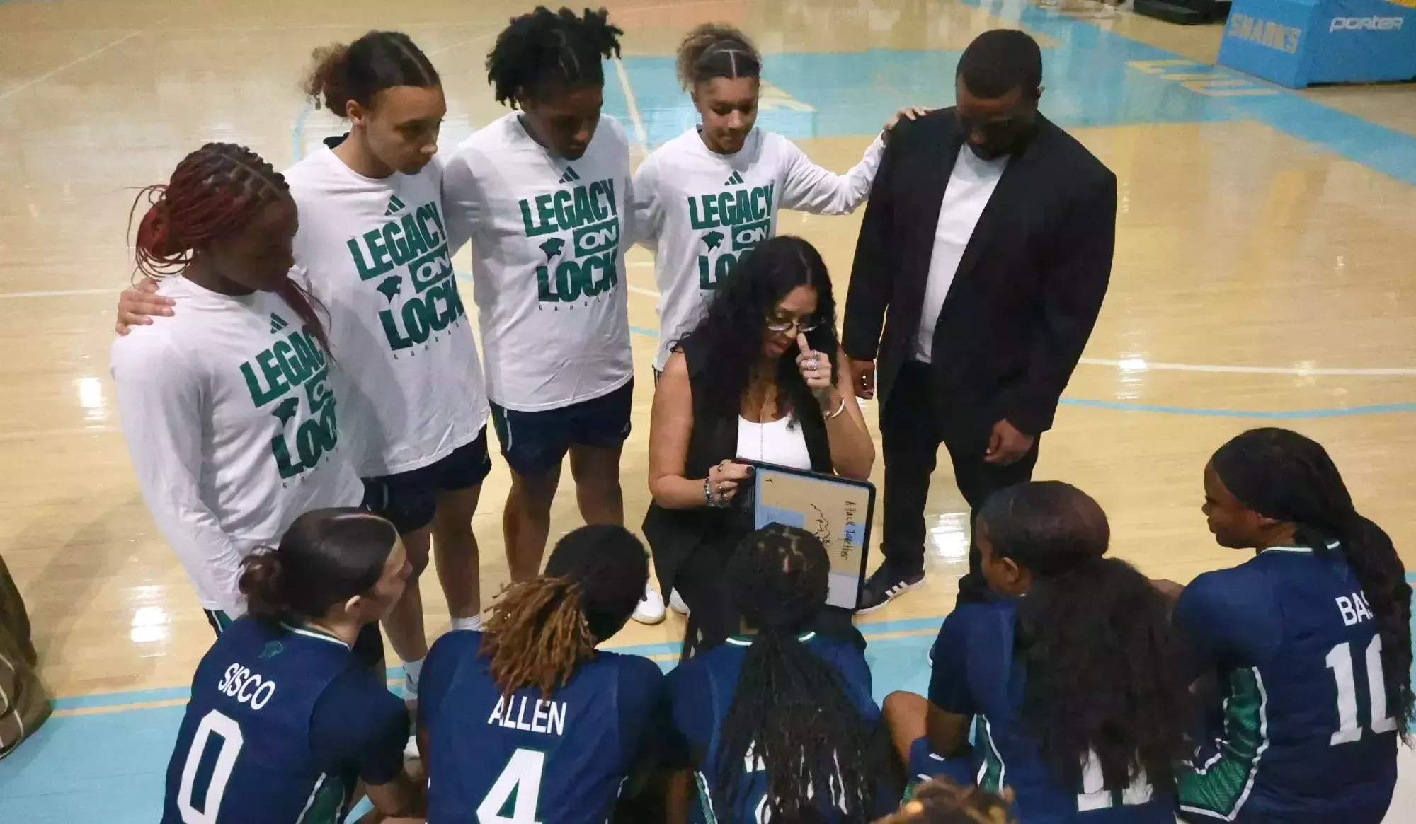 Women's Basketball Team Huddle 