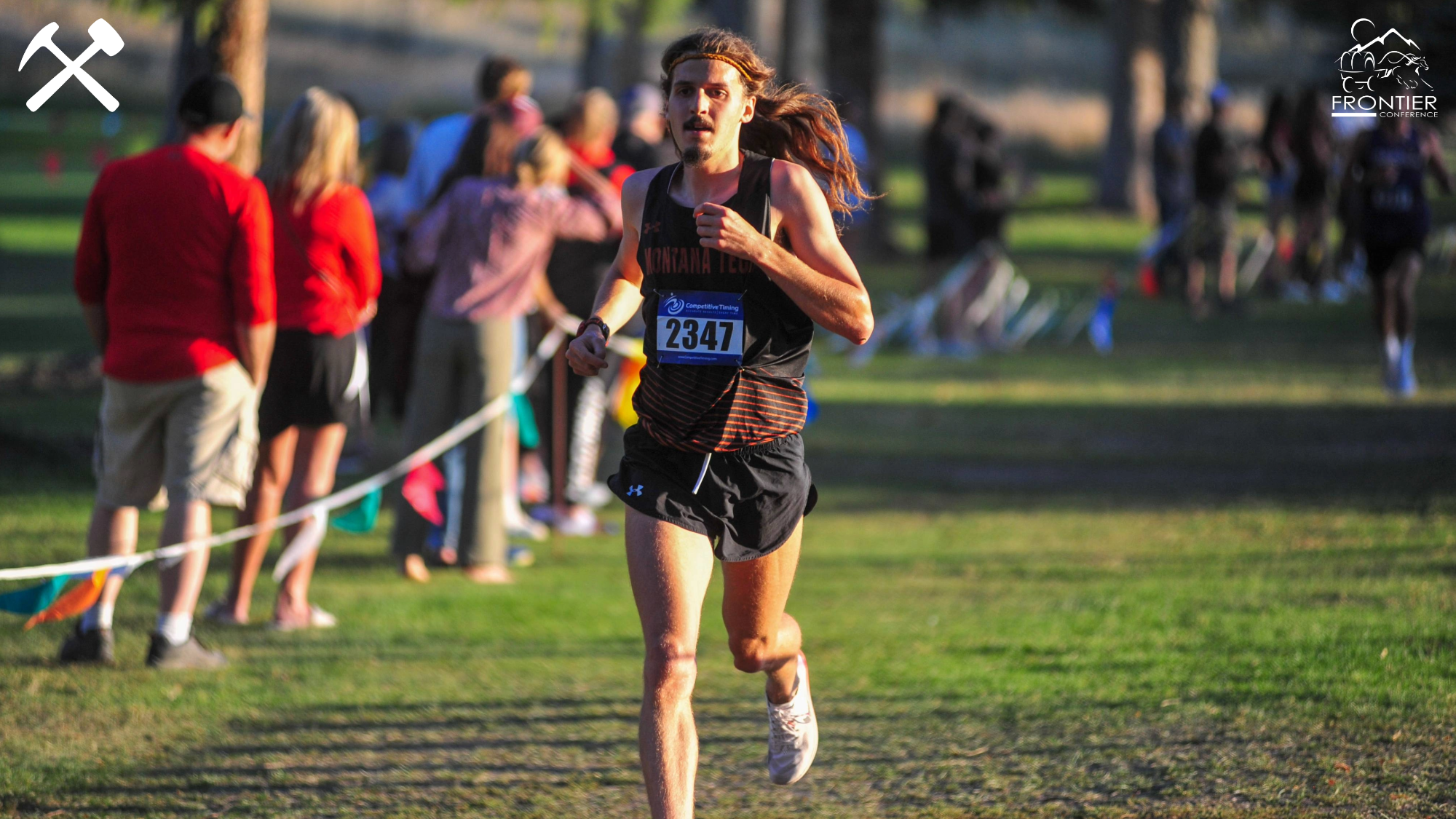 Ben Zerr running in a Montana Tech cross country meet