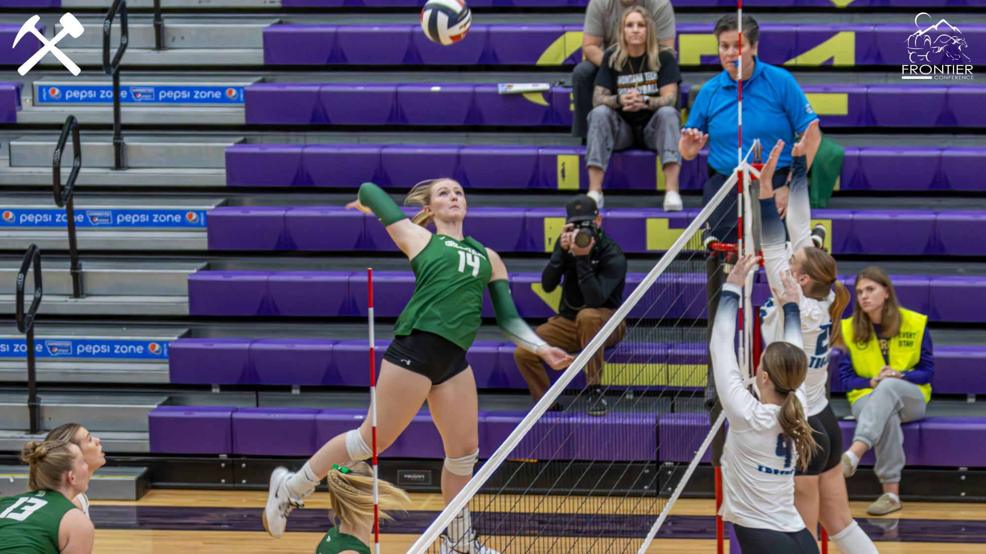 Kinnidi Willmore spikes the volleyball in a Montana Tech match