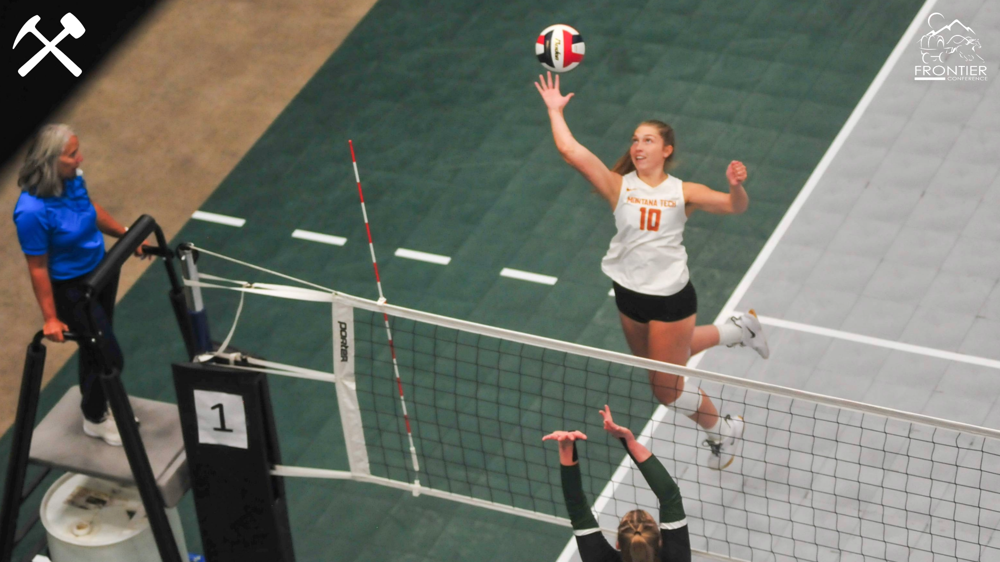 Payton Treadwell spikes the volleyball during a Montana Tech match