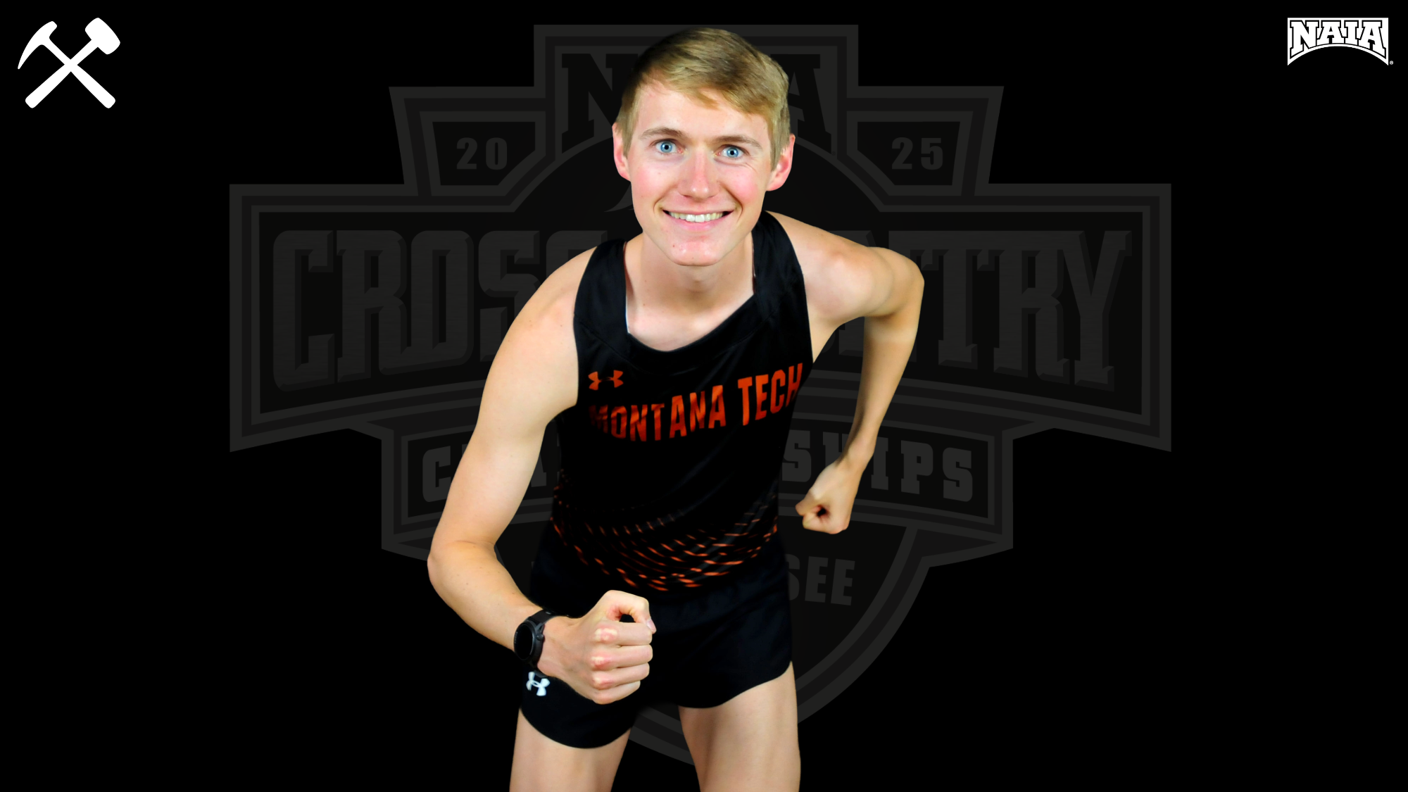 Justin Morgan in a cross country uniform in a starting pose