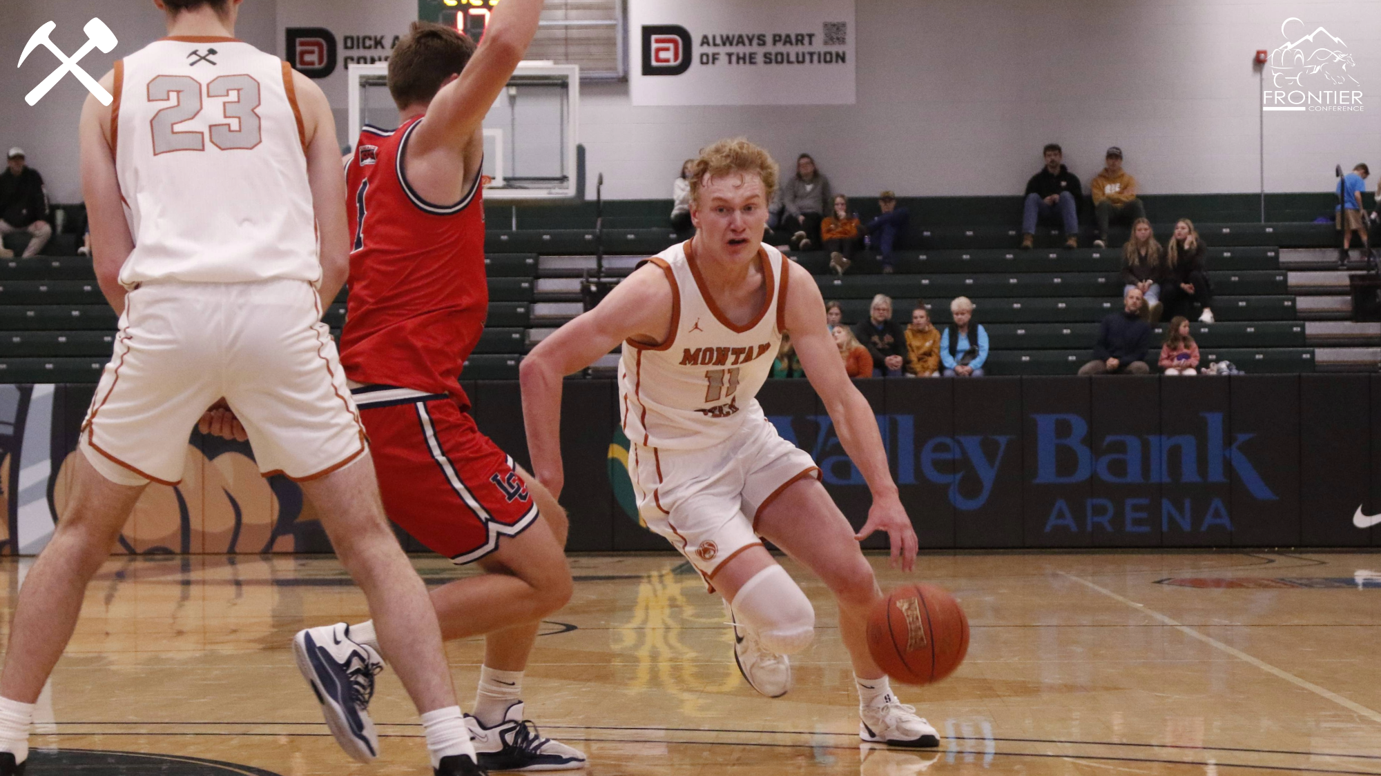 Hayden Diekhans driving during a basketball game
