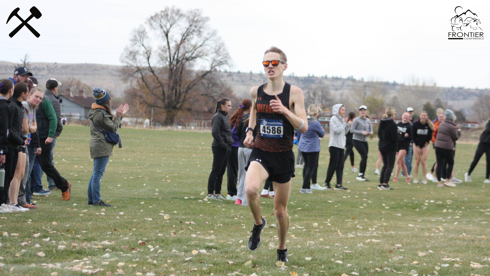 Justin Morgan running in the lead at the 2025 Frontier Conference men's cross country championship