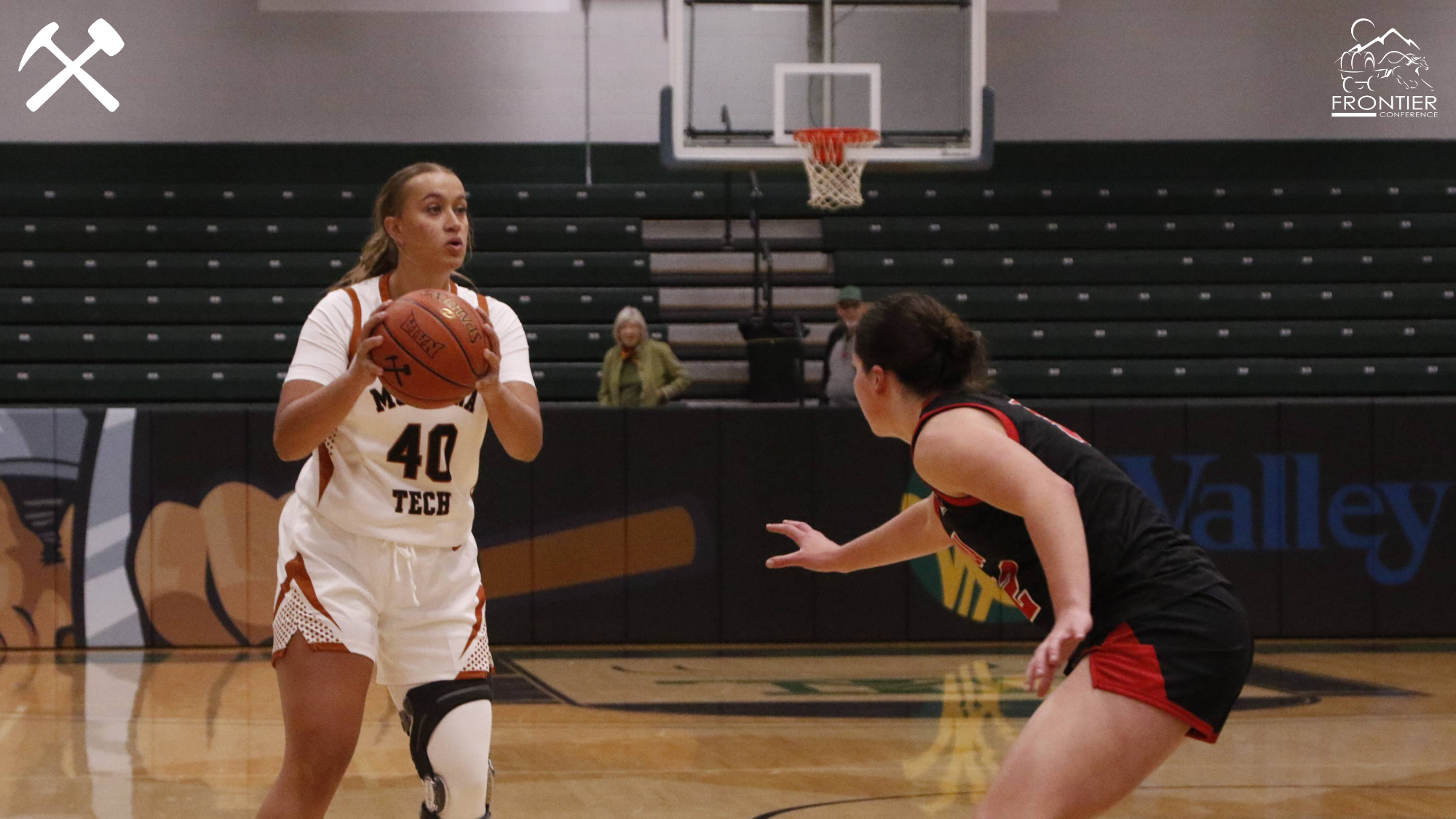 Olivia Nielson playing in a Montana Tech women's basketball game