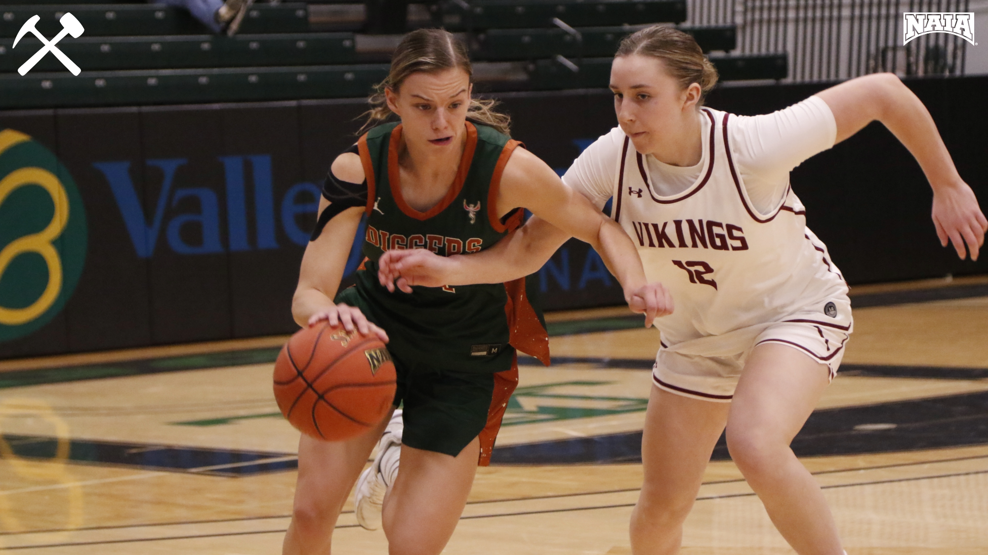 Izzy Arave drives against a defender during a home Montana Tech women's basketball game