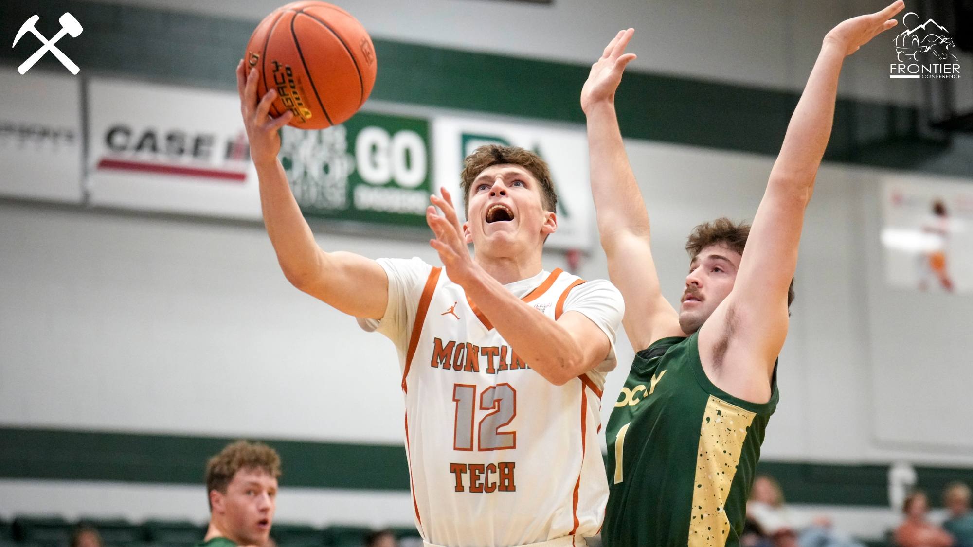 Montana Tech's Asher Williams attempts a contested layup during a home men's basketball game