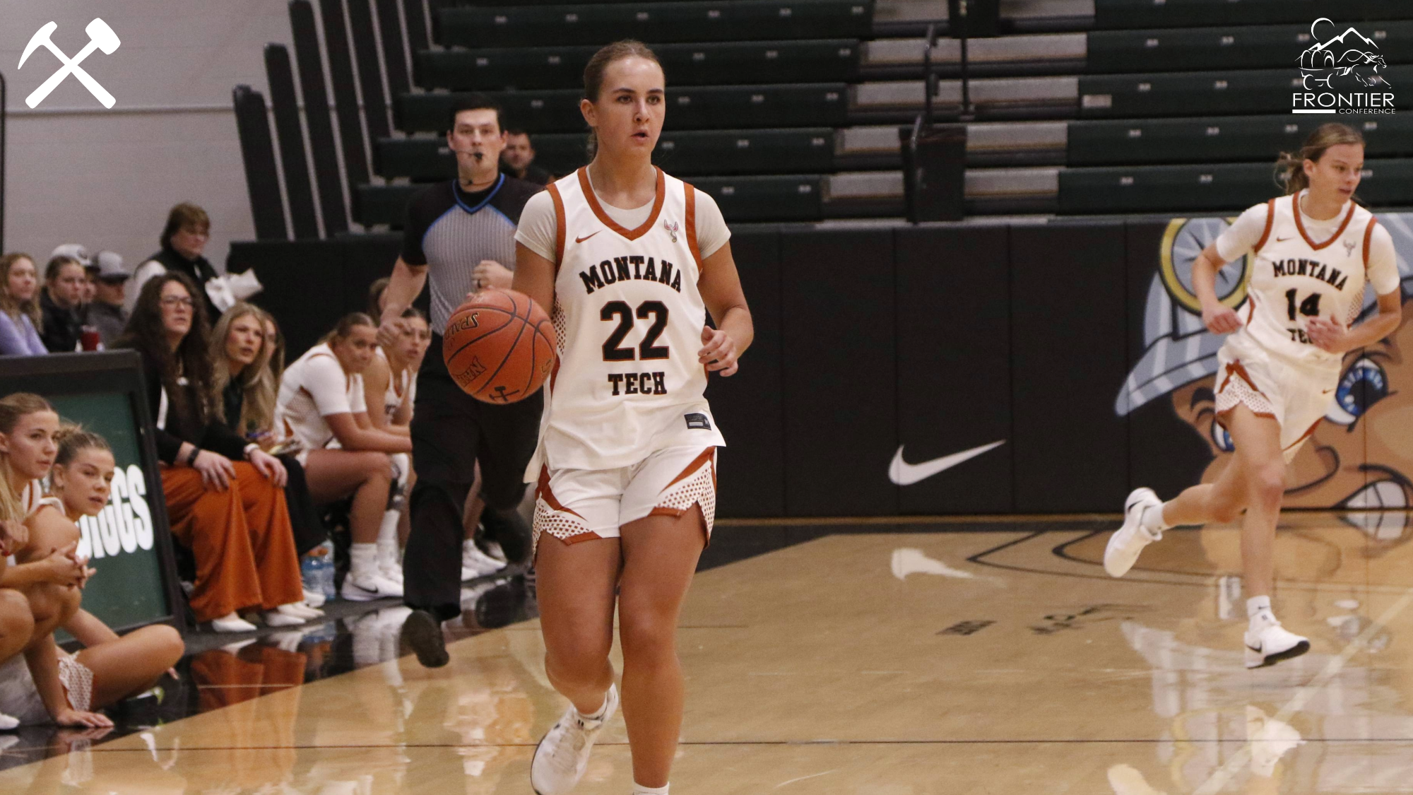 Brooke Badovinac dribbles the ball upcourt during a Montana Tech women's basketball home game.