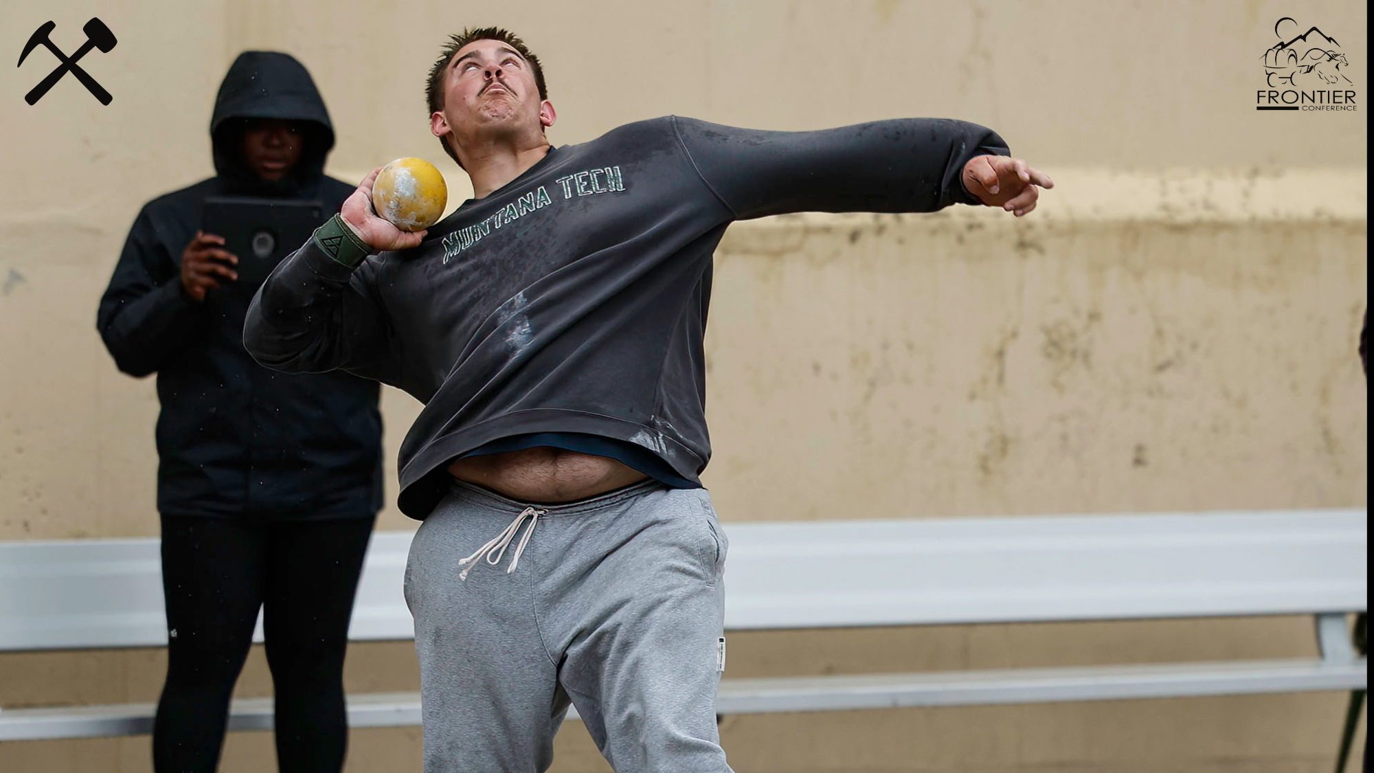 Cade VanVleet throwing the shot put in a Montana Tech track meet