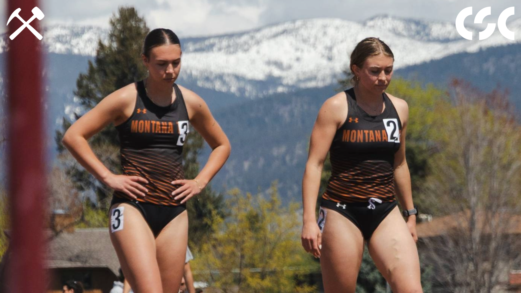 Jadyn Vermillion and Olleca Severson preparing to run the 100m hurdles in a track & field meet