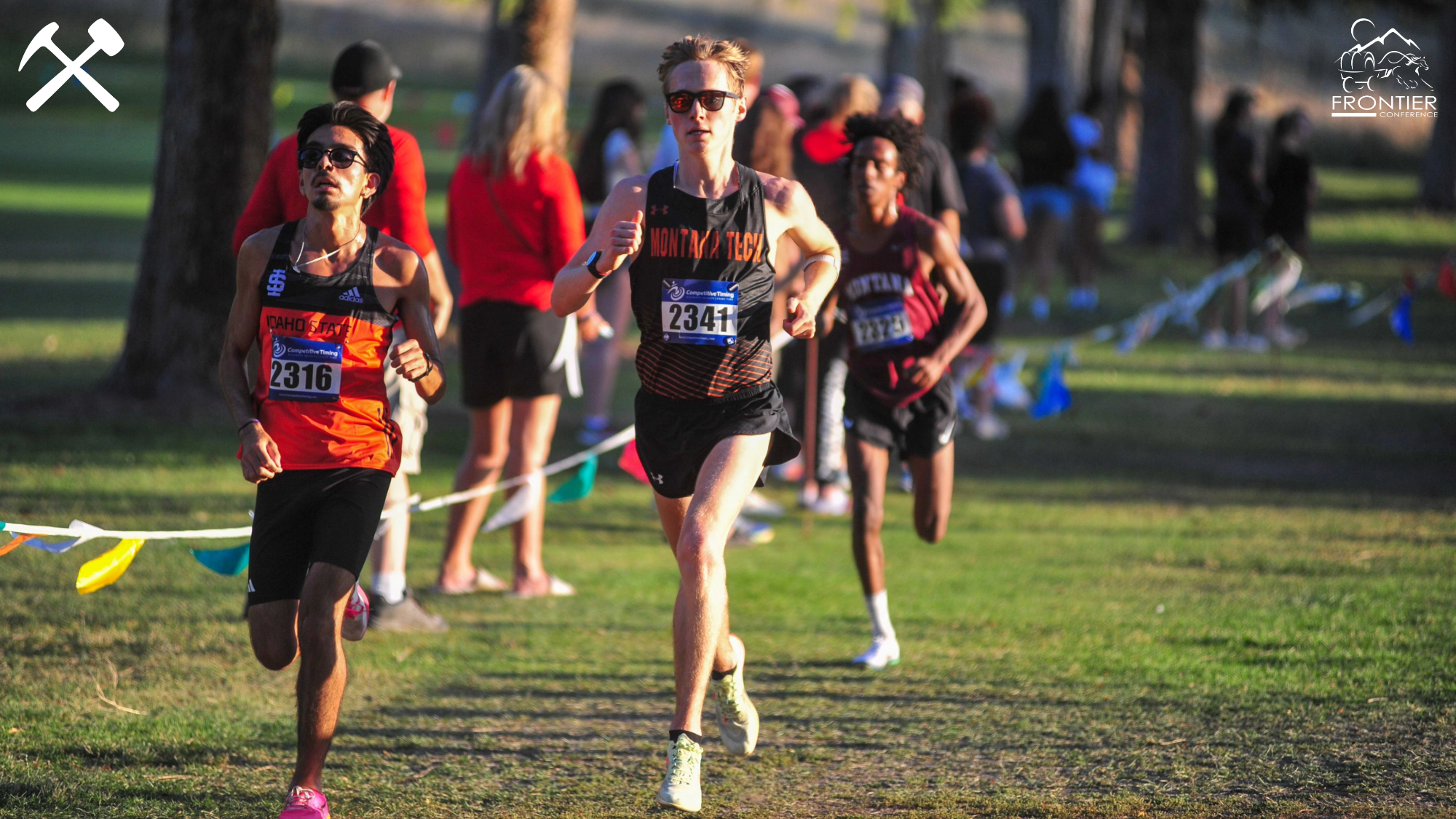 Justin Morgan running on a cross country course