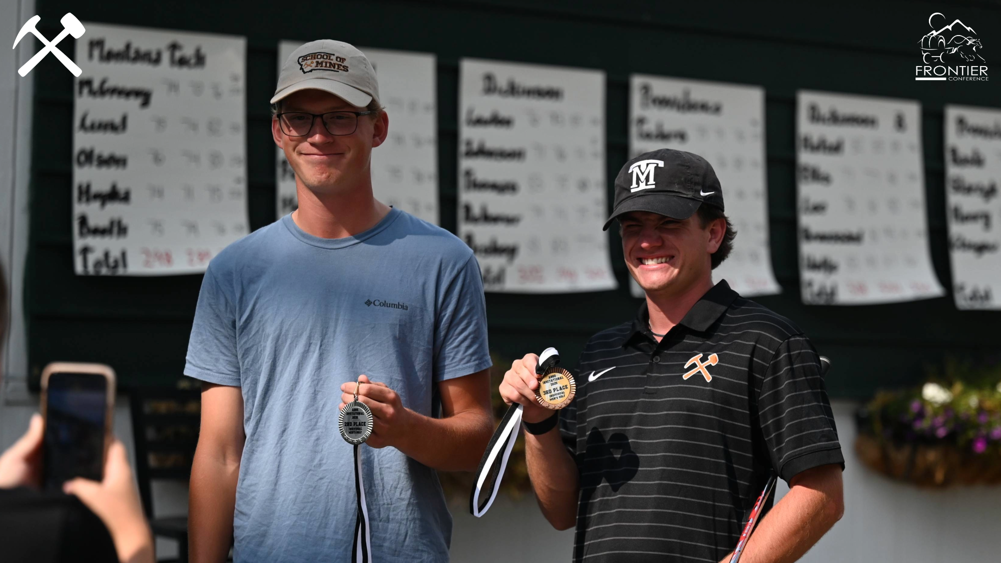 Carson Hupka and Joe McGreevey show off their medals after the Providence Invitational golf tournament
