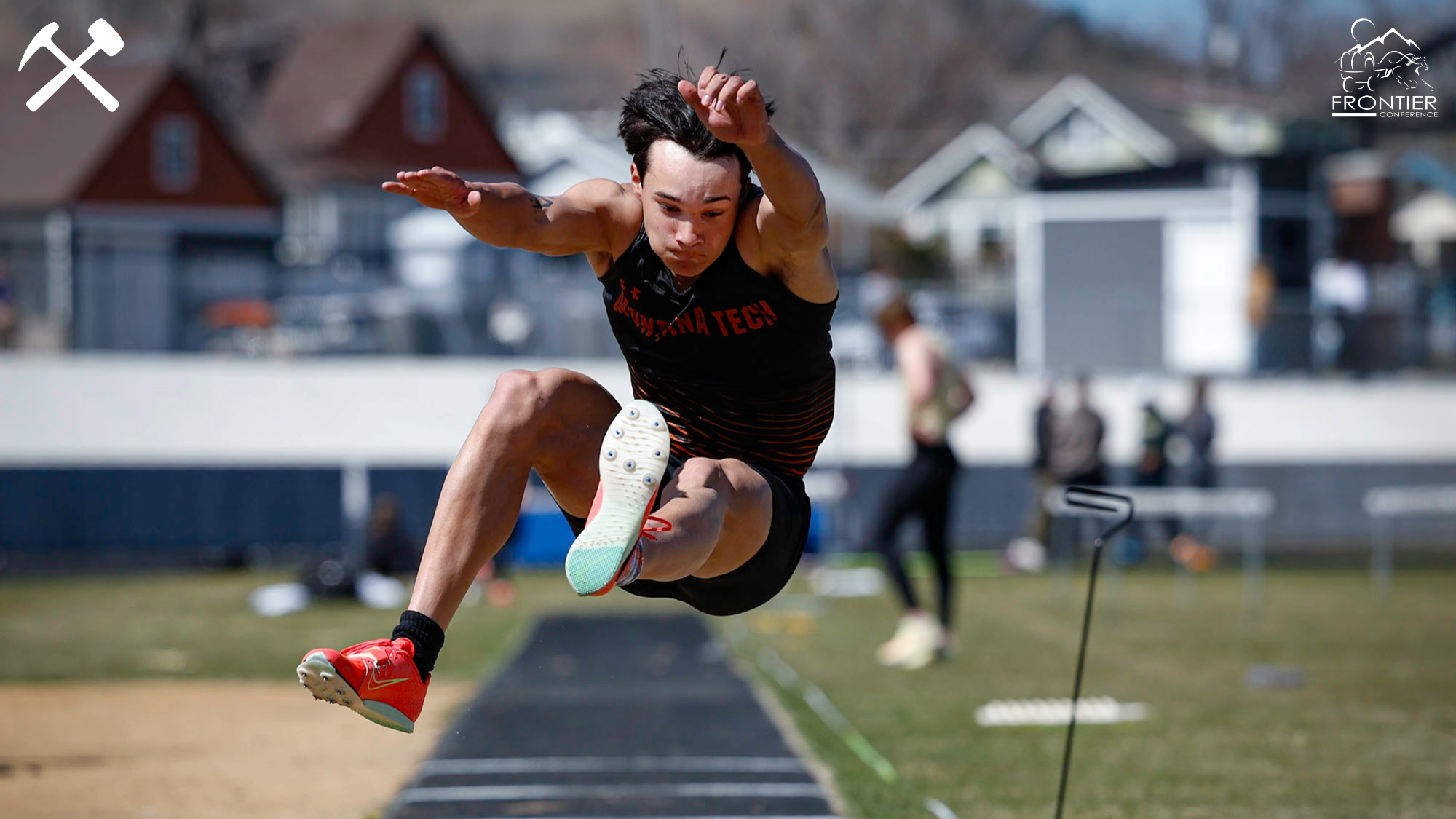 Nico Lancini jumping during a track meet