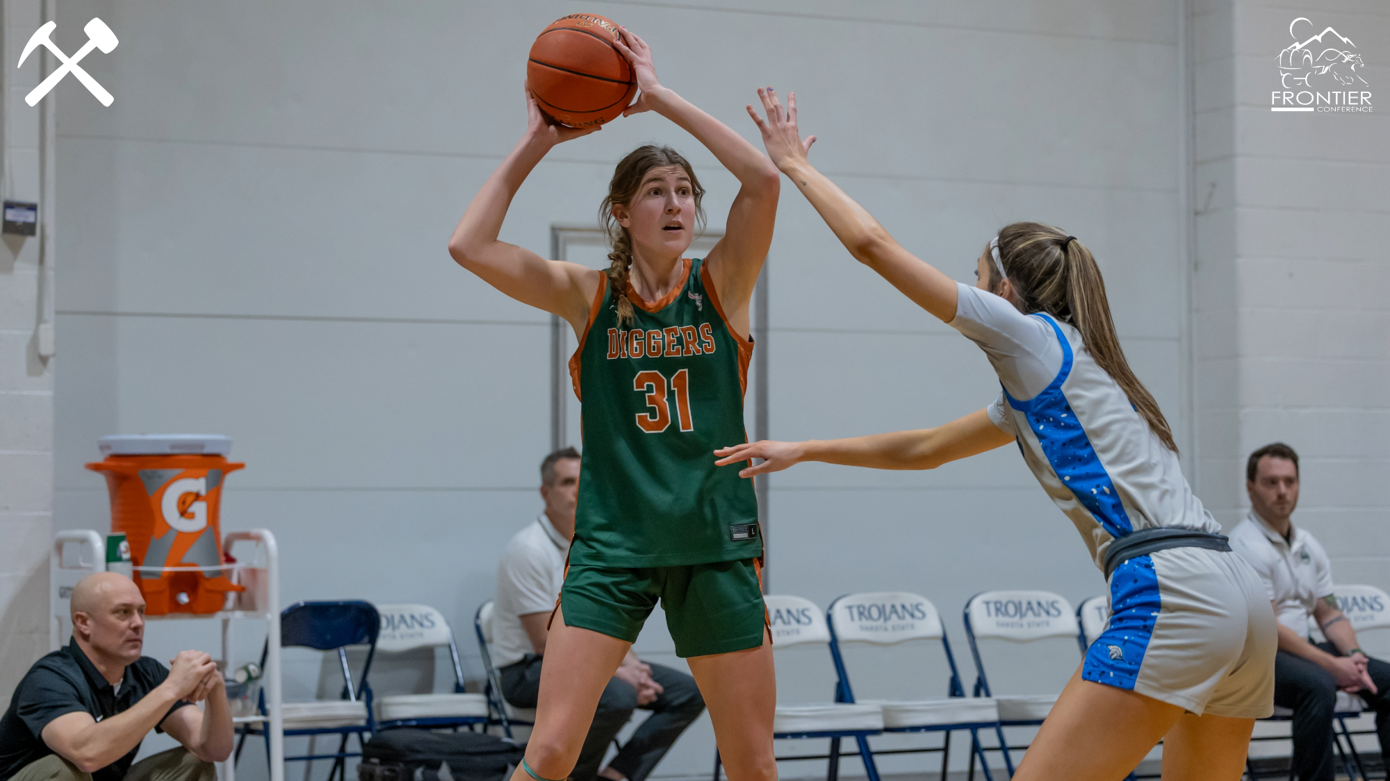 Halle Haber looks to pass the basketball during a Montana Tech women's game