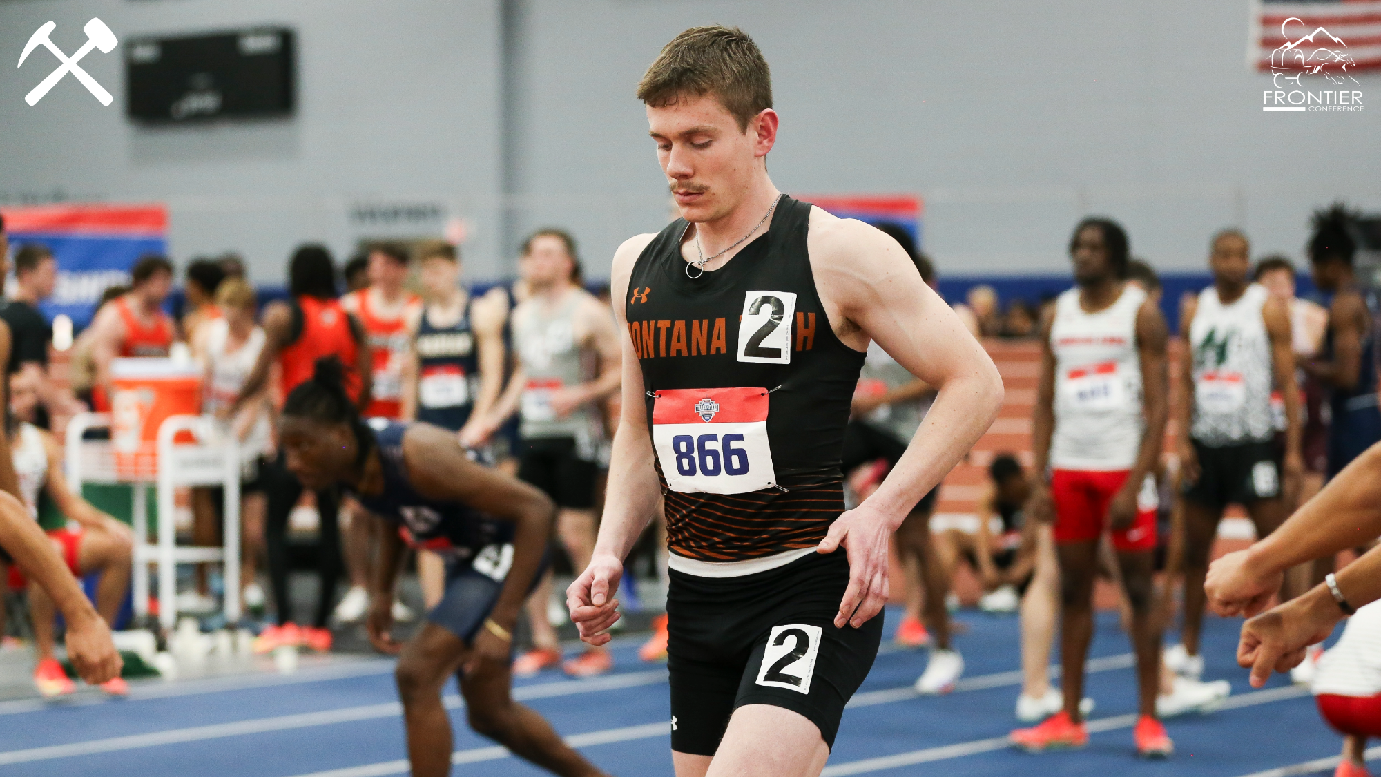 Matt Moreni prepares to run a race at an indoor track meet